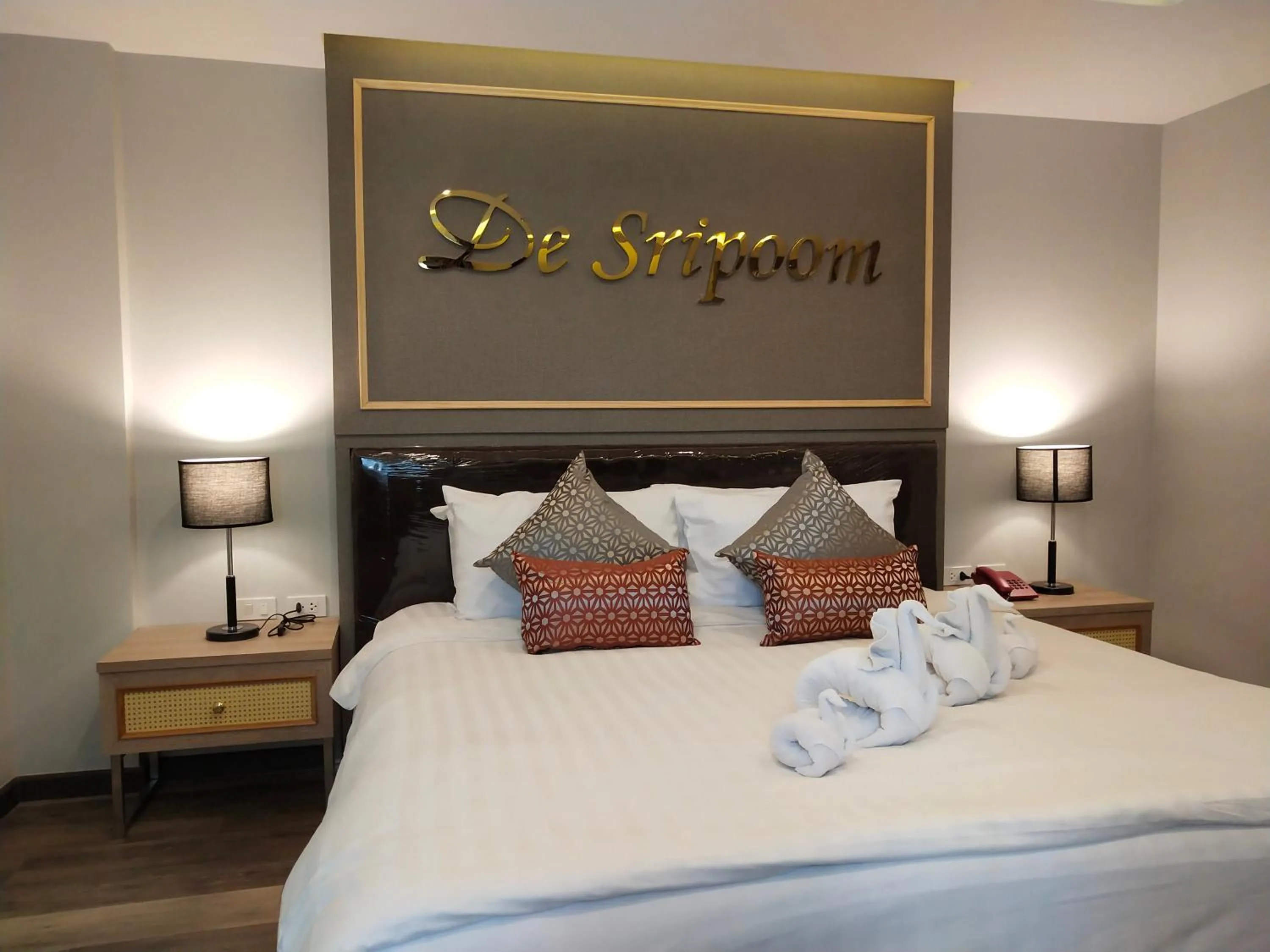 Bed in Hotel De Sripoom