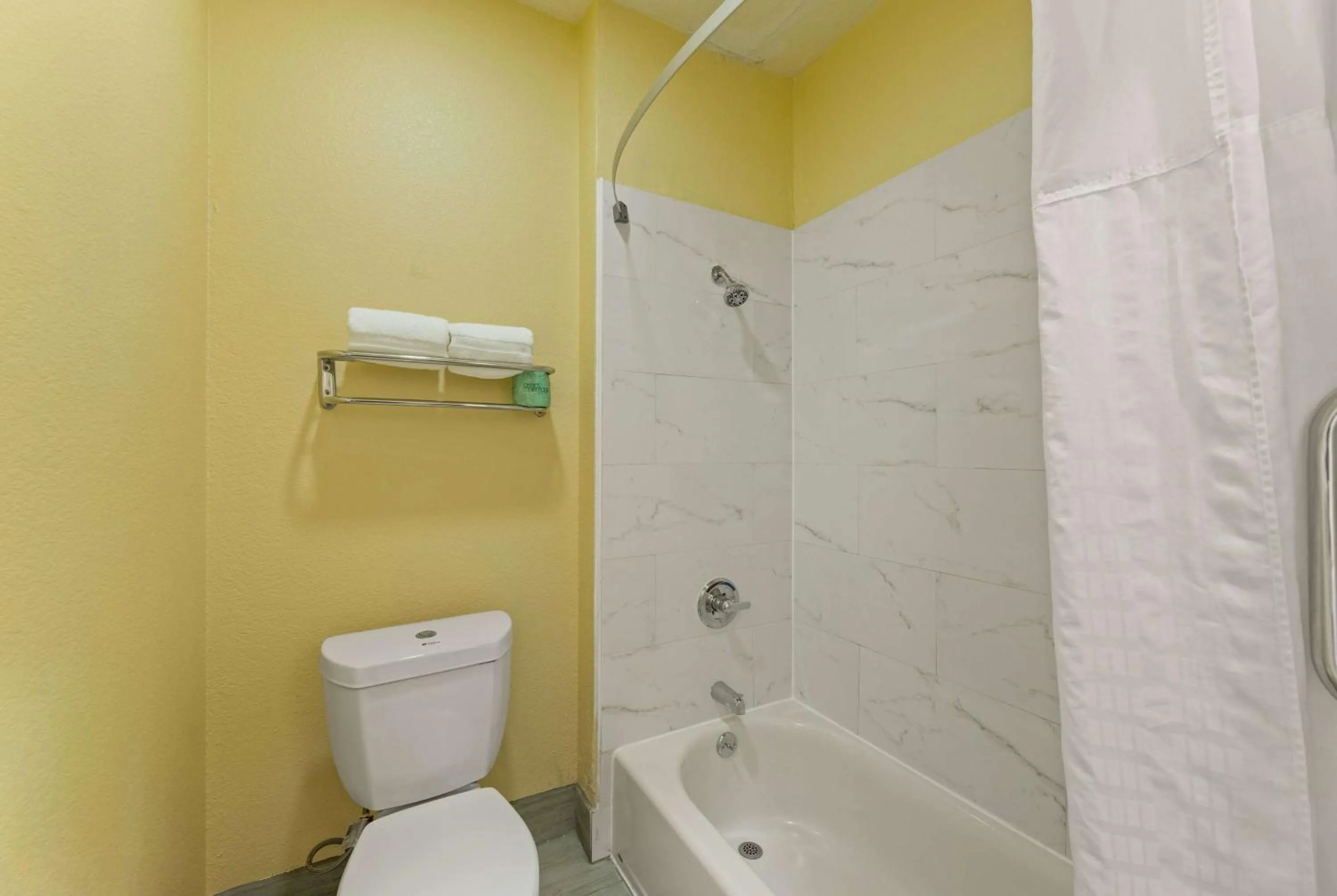 Bathroom in Days Inn & Suites by Wyndham DFW Airport South-Euless