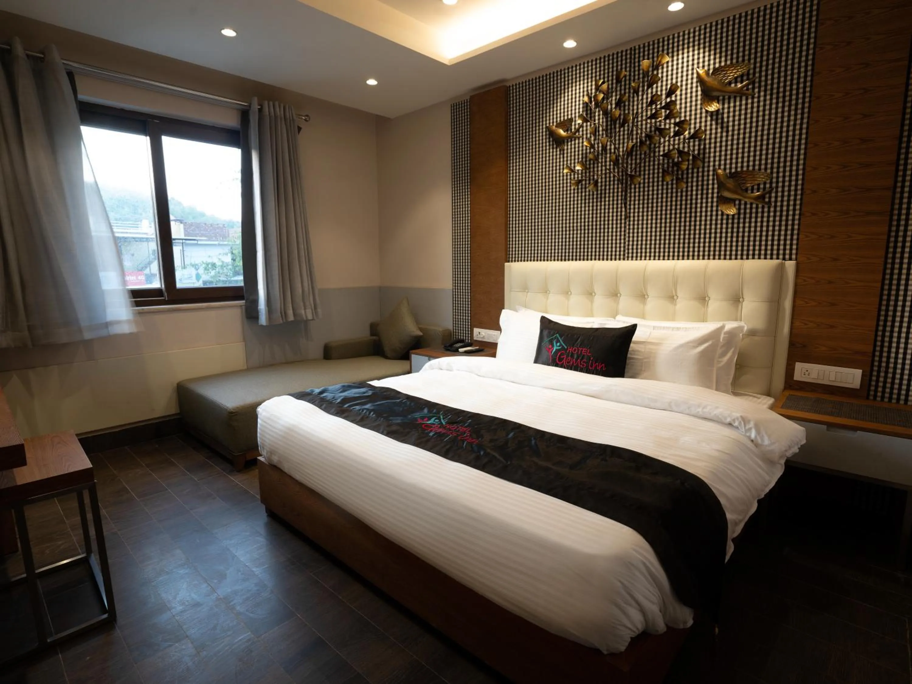 Bed in Hotel Gems Inn