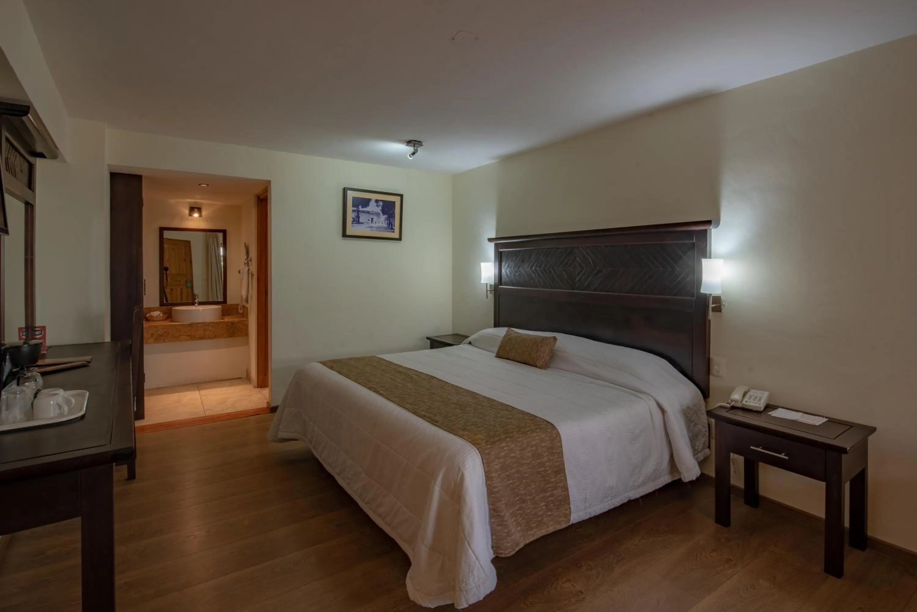 Bed in Plaza Magnolias Suites