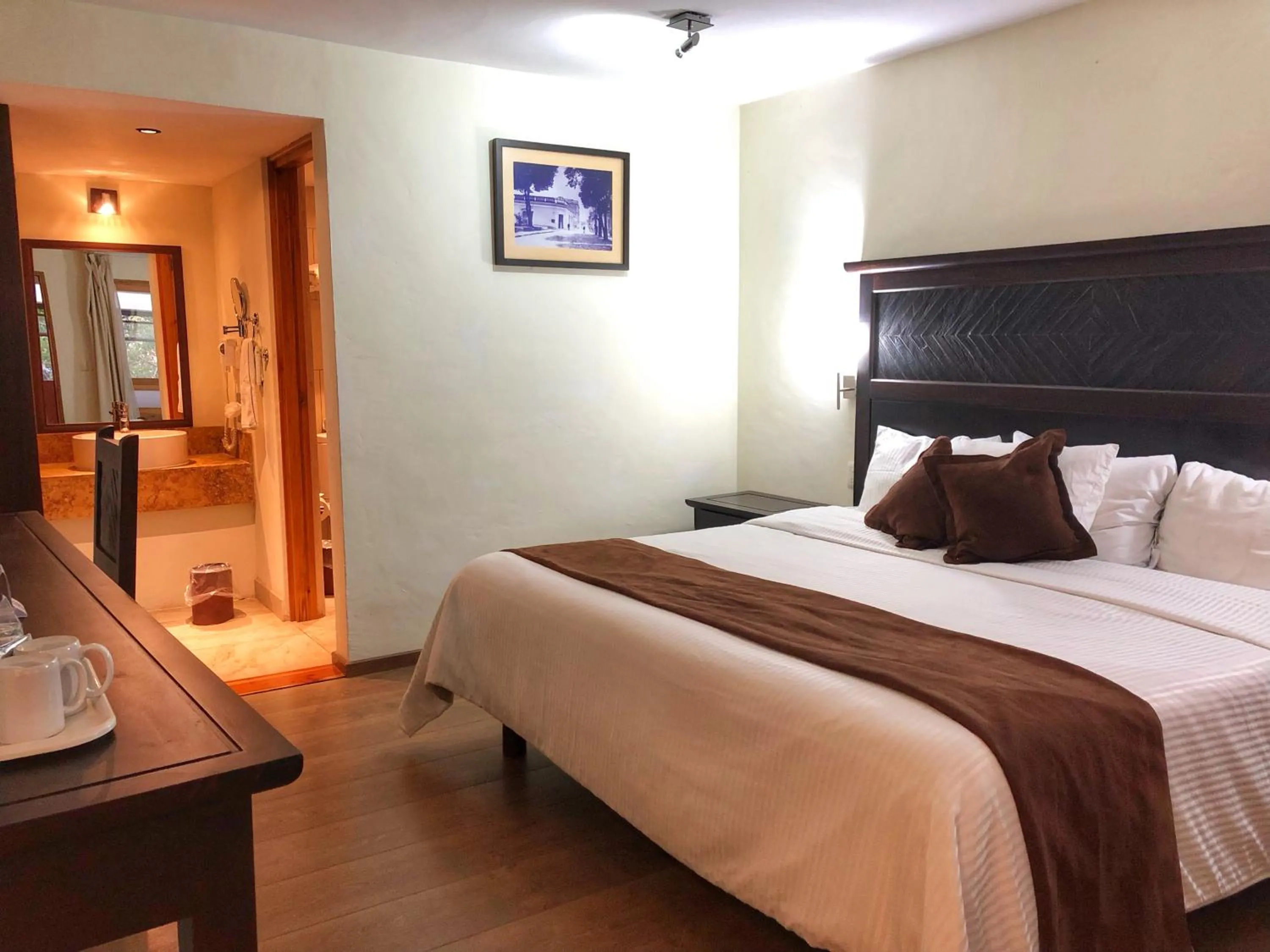 Bed in Plaza Magnolias Suites