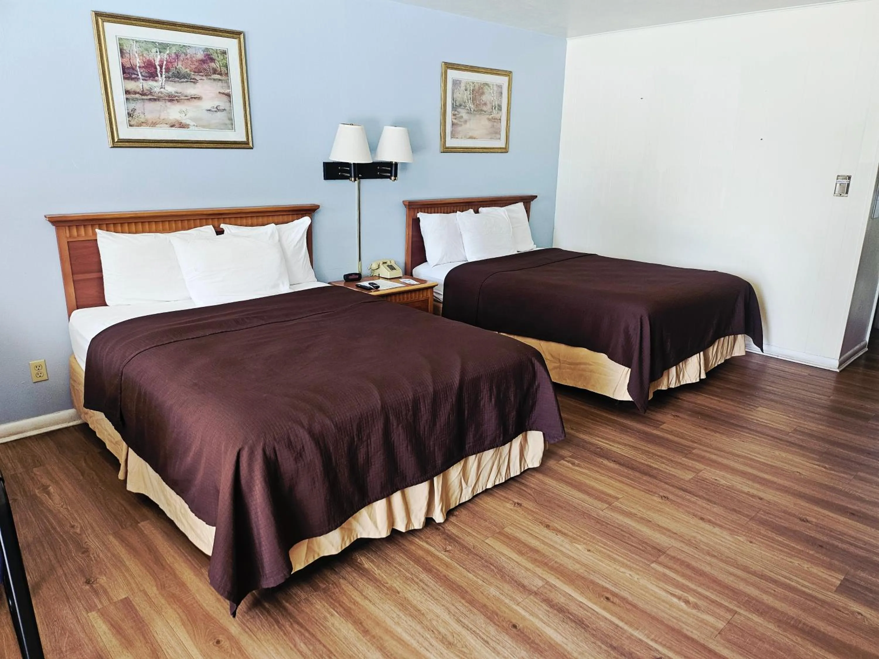 Bed in The Budget Inn Express