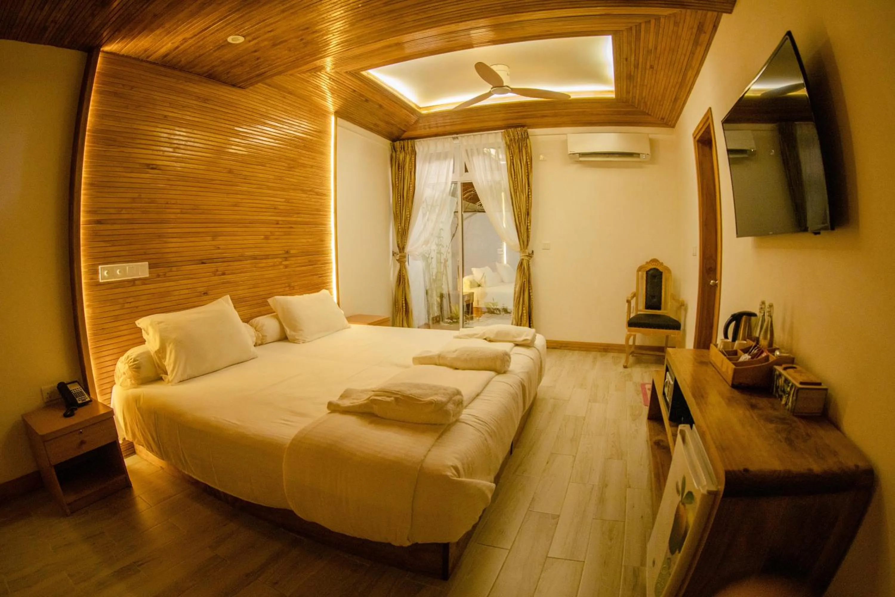 Photo of the whole room, Bed in PERLA Dhangethi