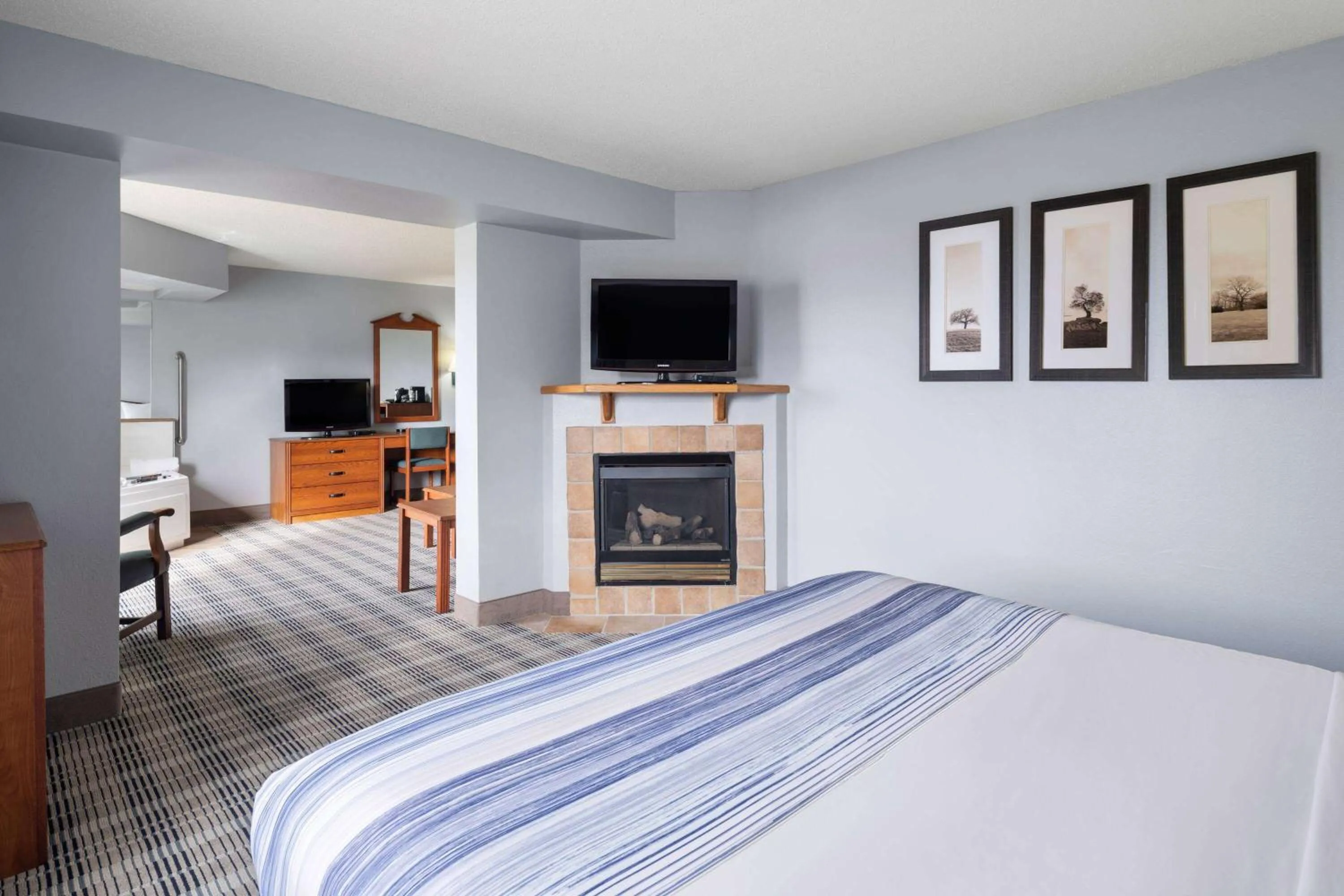 Photo of the whole room, Bed in AmericInn by Wyndham Stuart