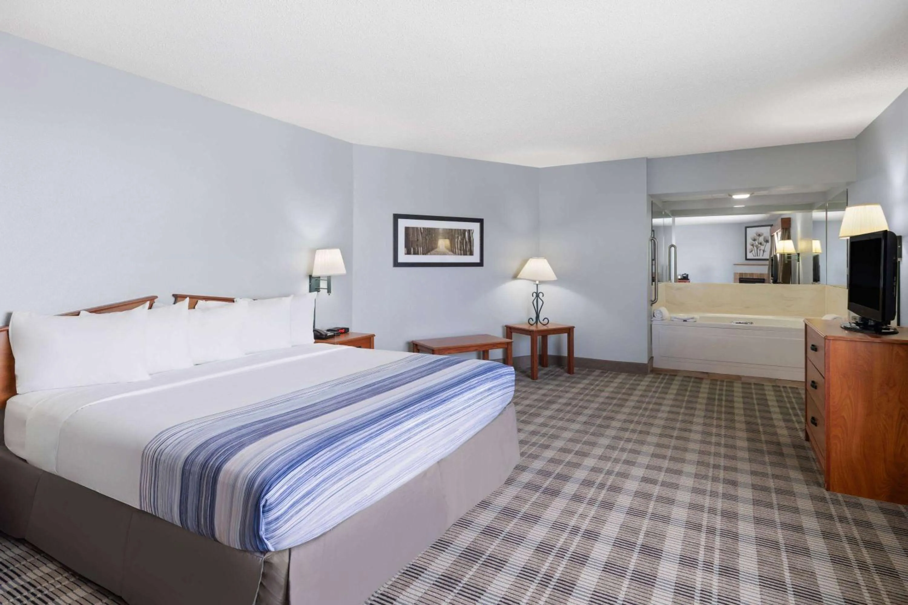 Photo of the whole room, Bed in AmericInn by Wyndham Stuart