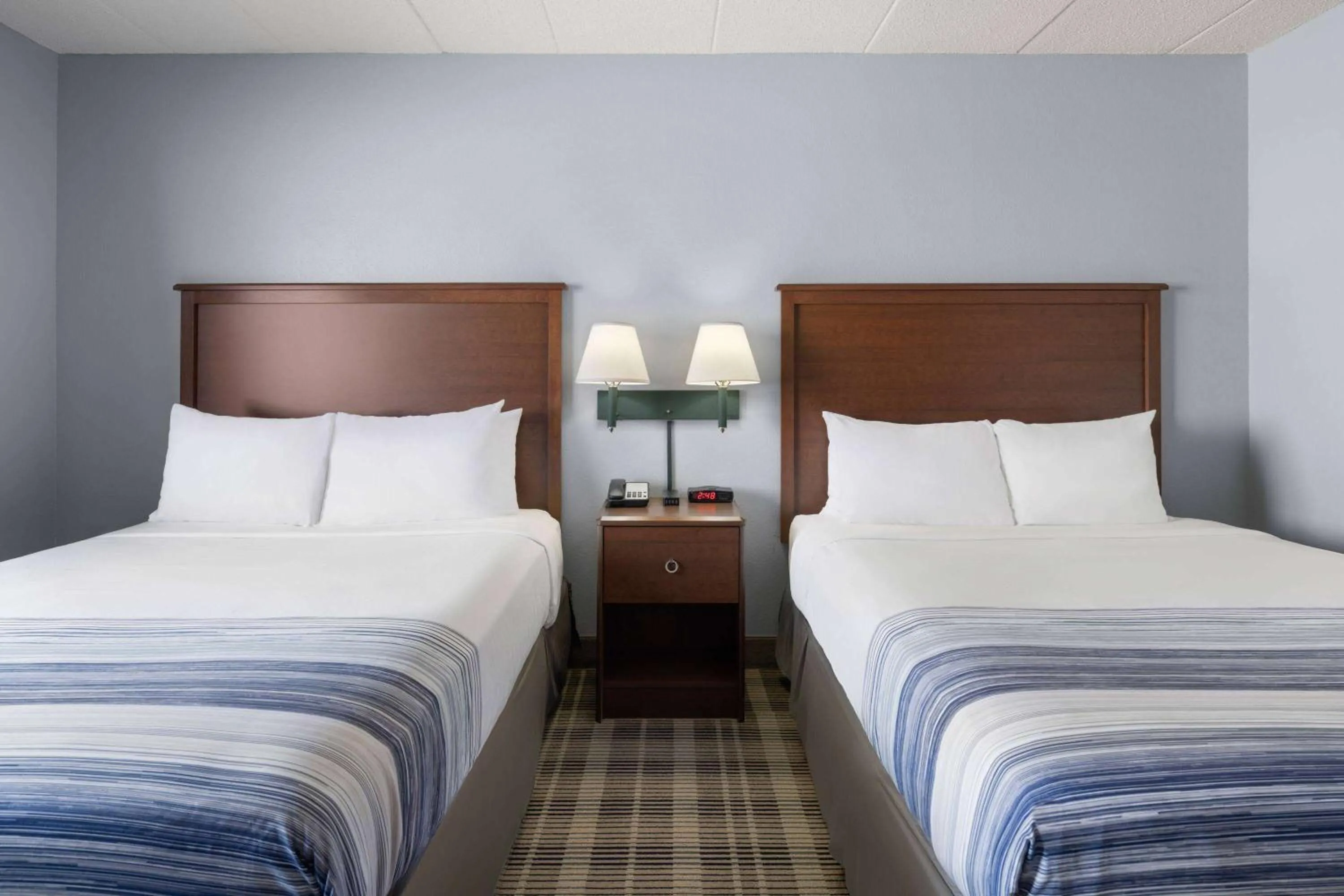Photo of the whole room, Bed in AmericInn by Wyndham Stuart