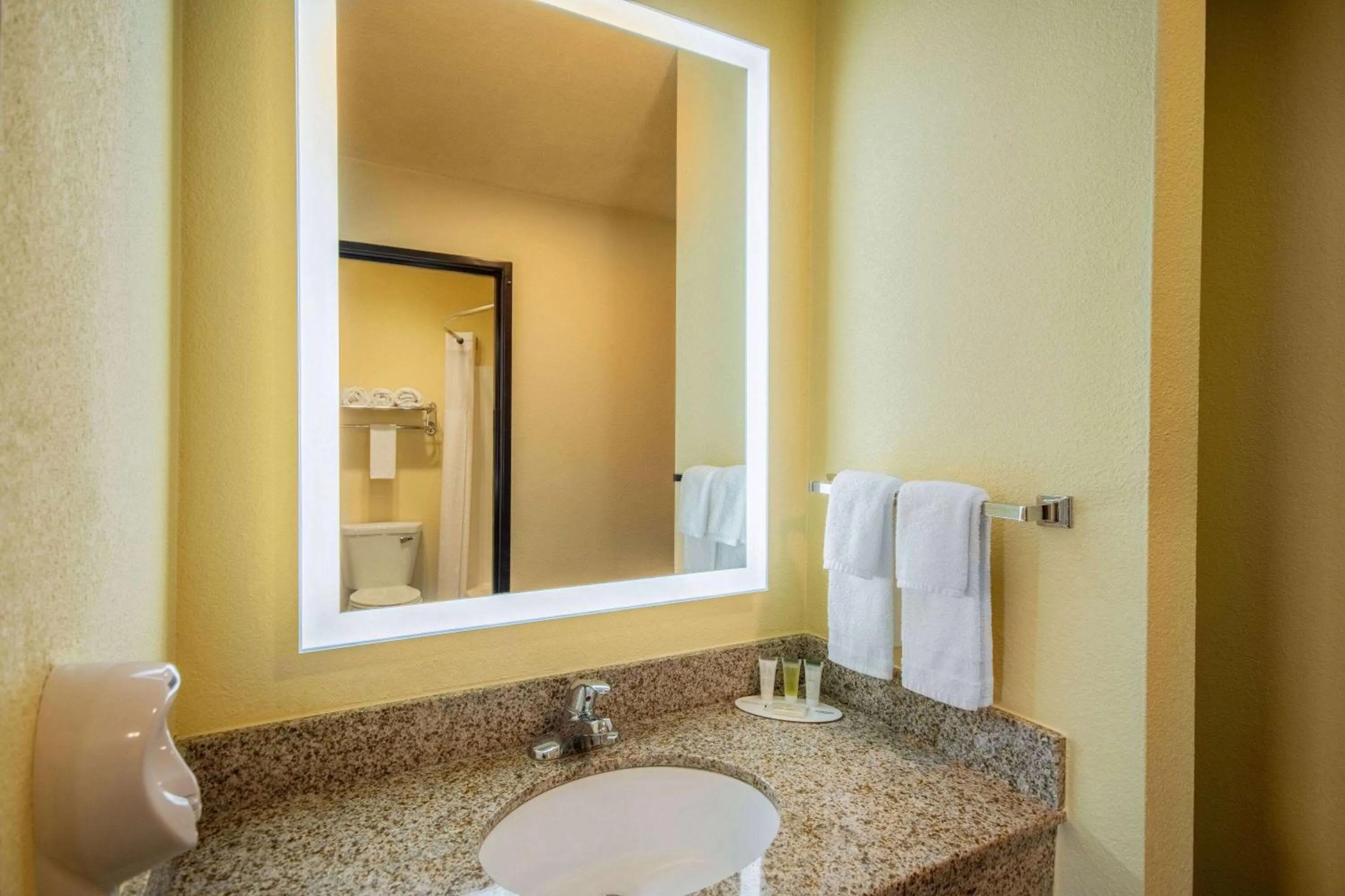 Bathroom in Days Inn by Wyndham Evansdale Waterloo