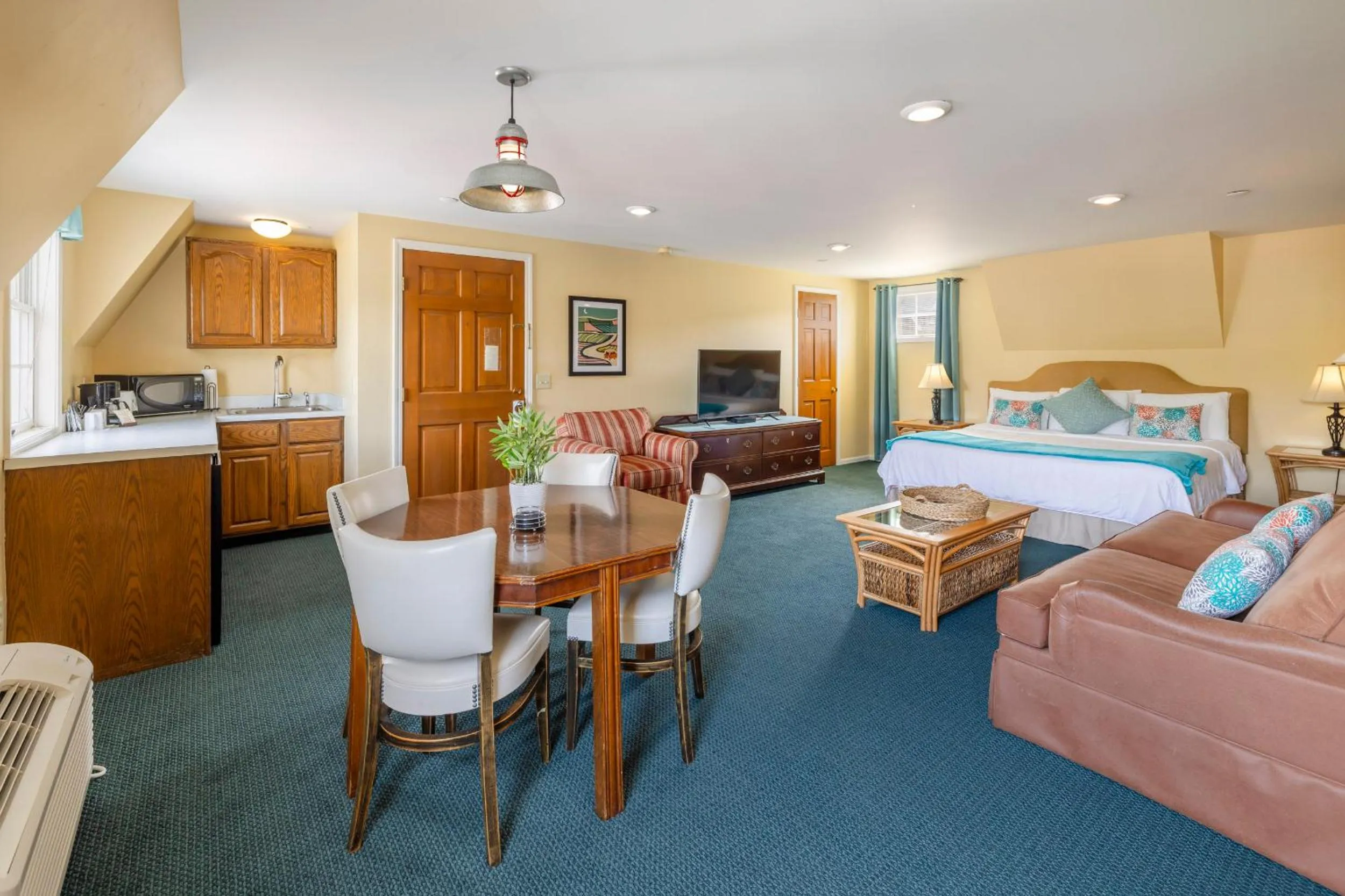 Bed in Old Harbor Inn