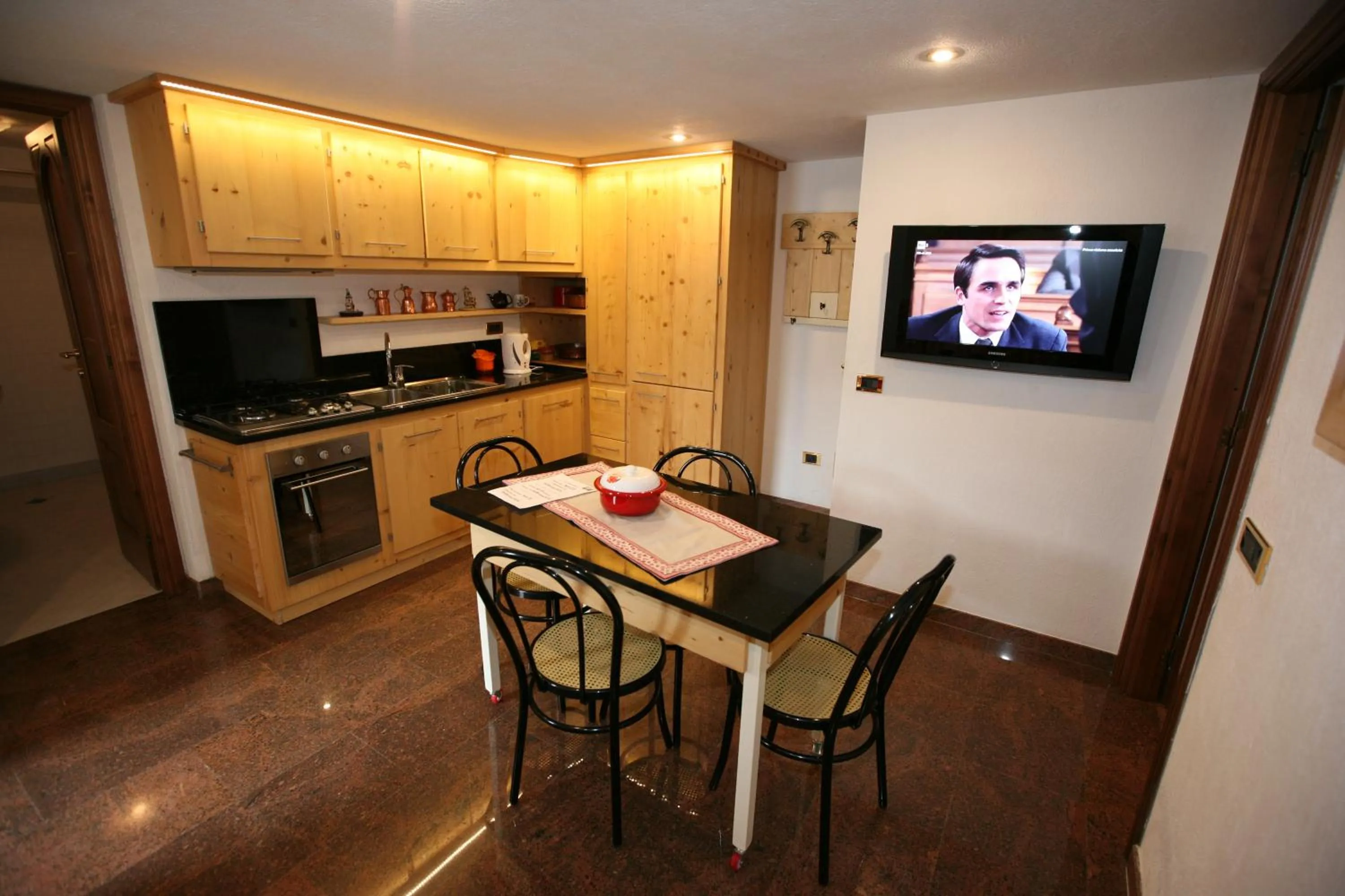 Kitchen or kitchenette in SUITE DEL VILLAGGIO