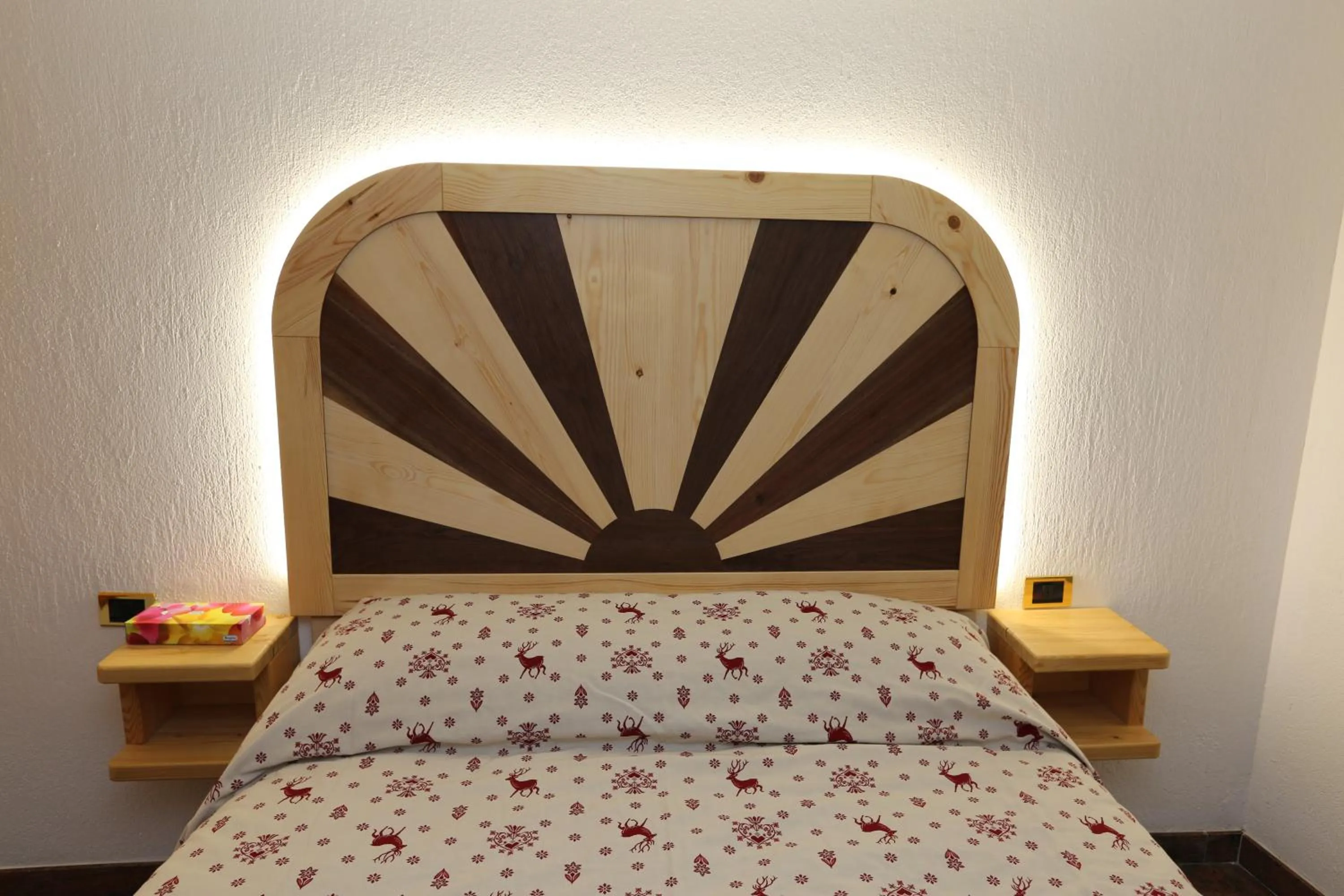 Bed in SUITE DEL VILLAGGIO