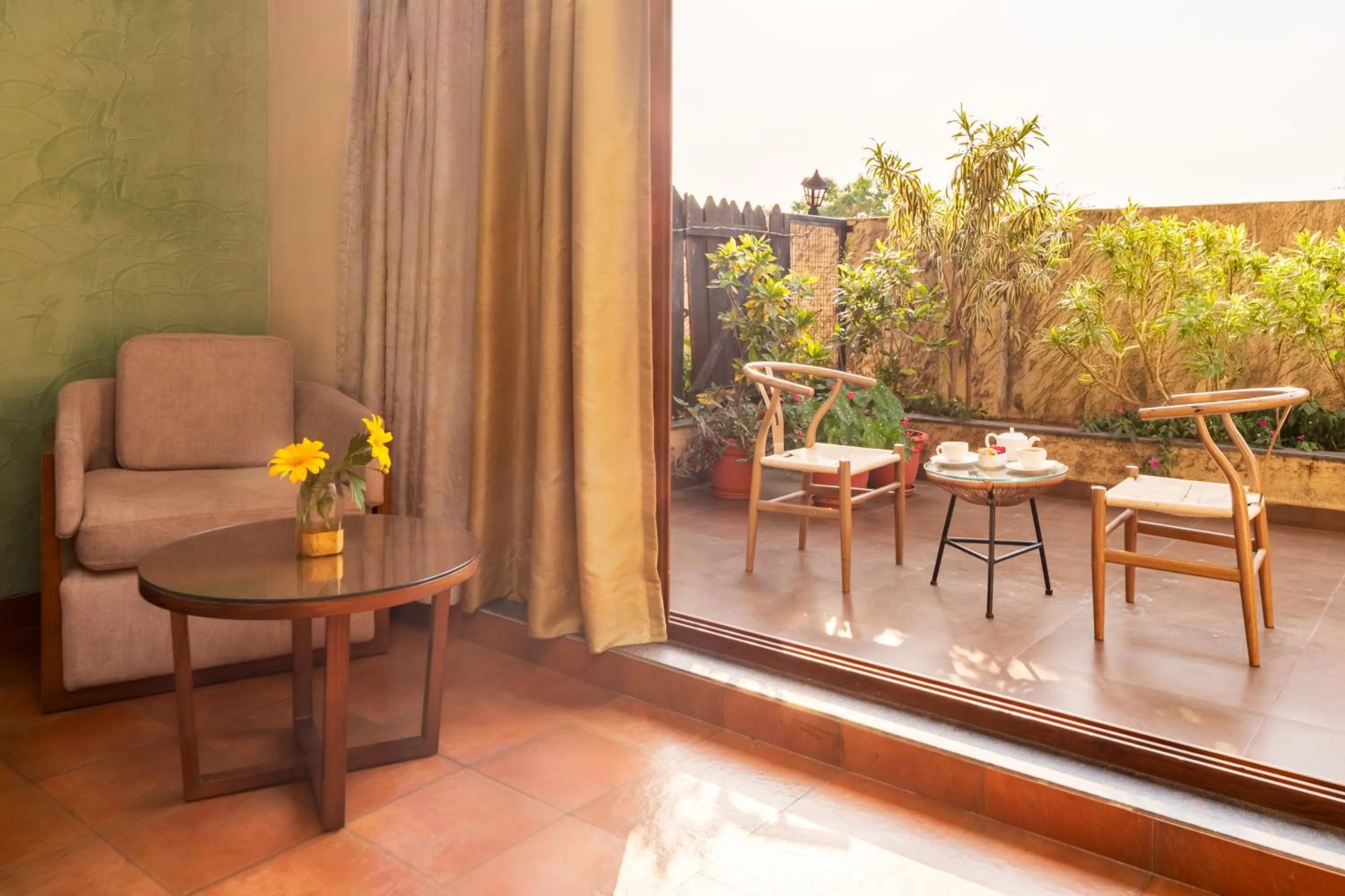 Seating area in The Summer House, Pachmarhi - AM Hotel Kollection