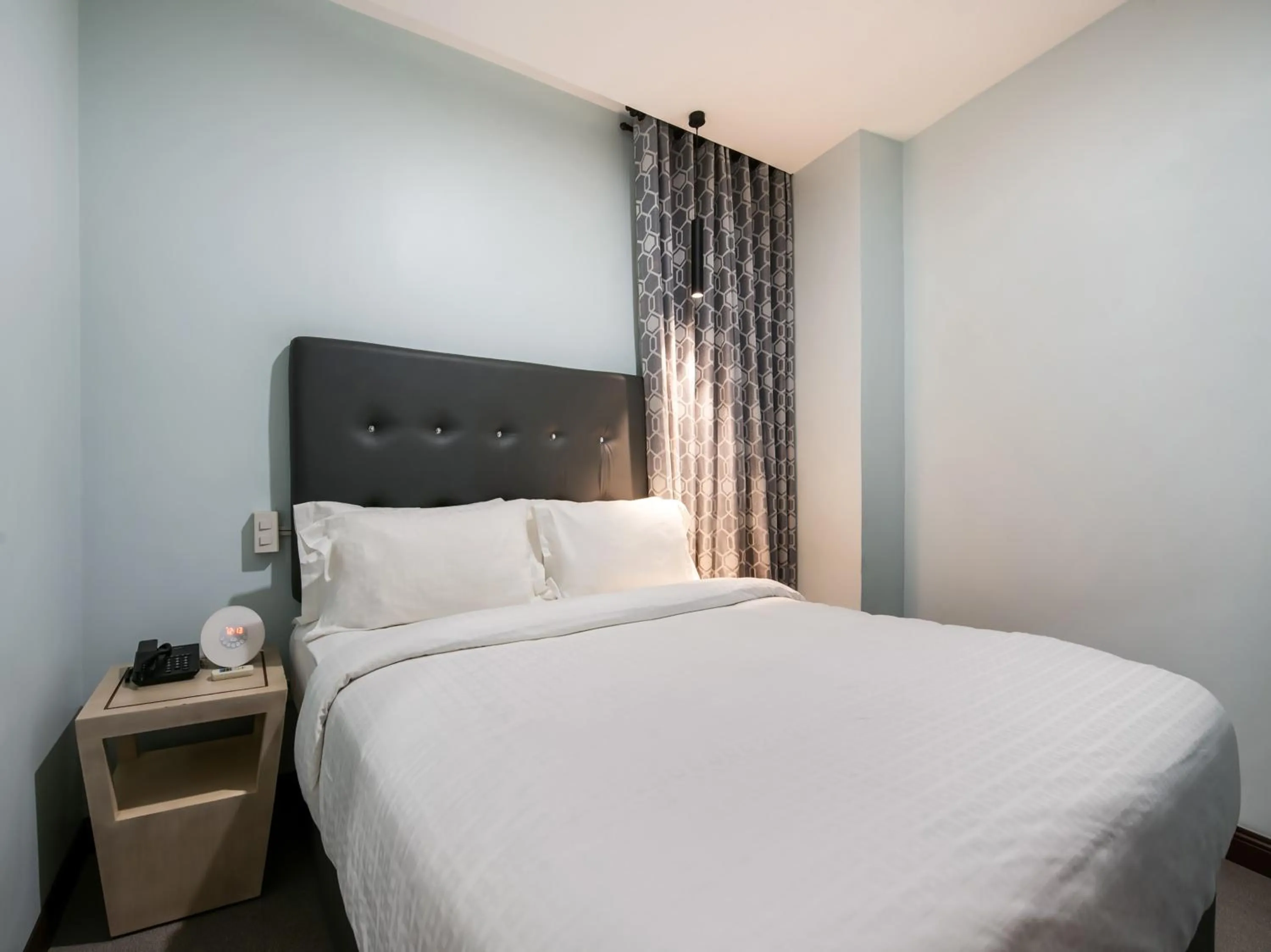 Bed in Bay Area Suites Manila