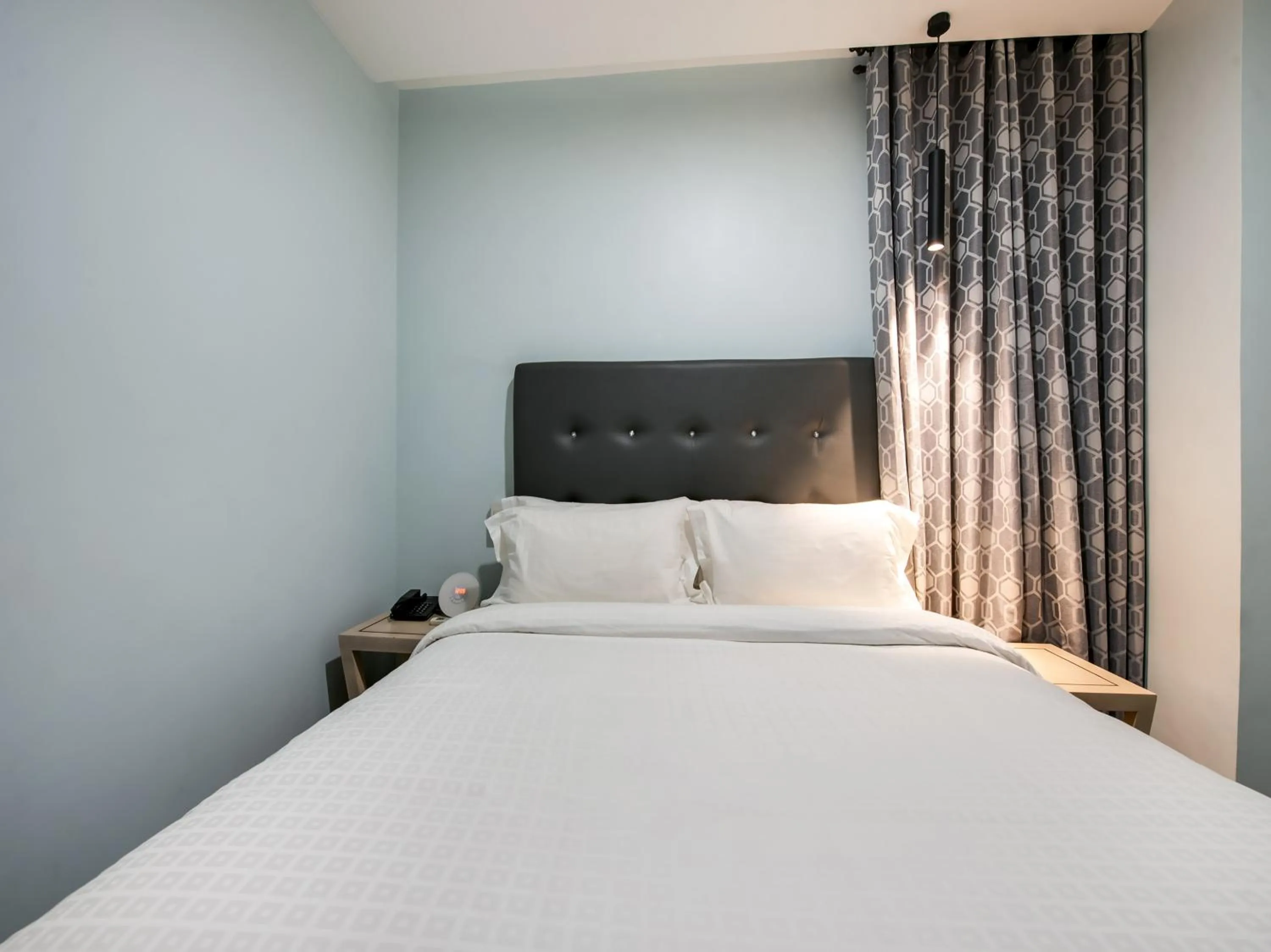 Bed in Bay Area Suites Manila