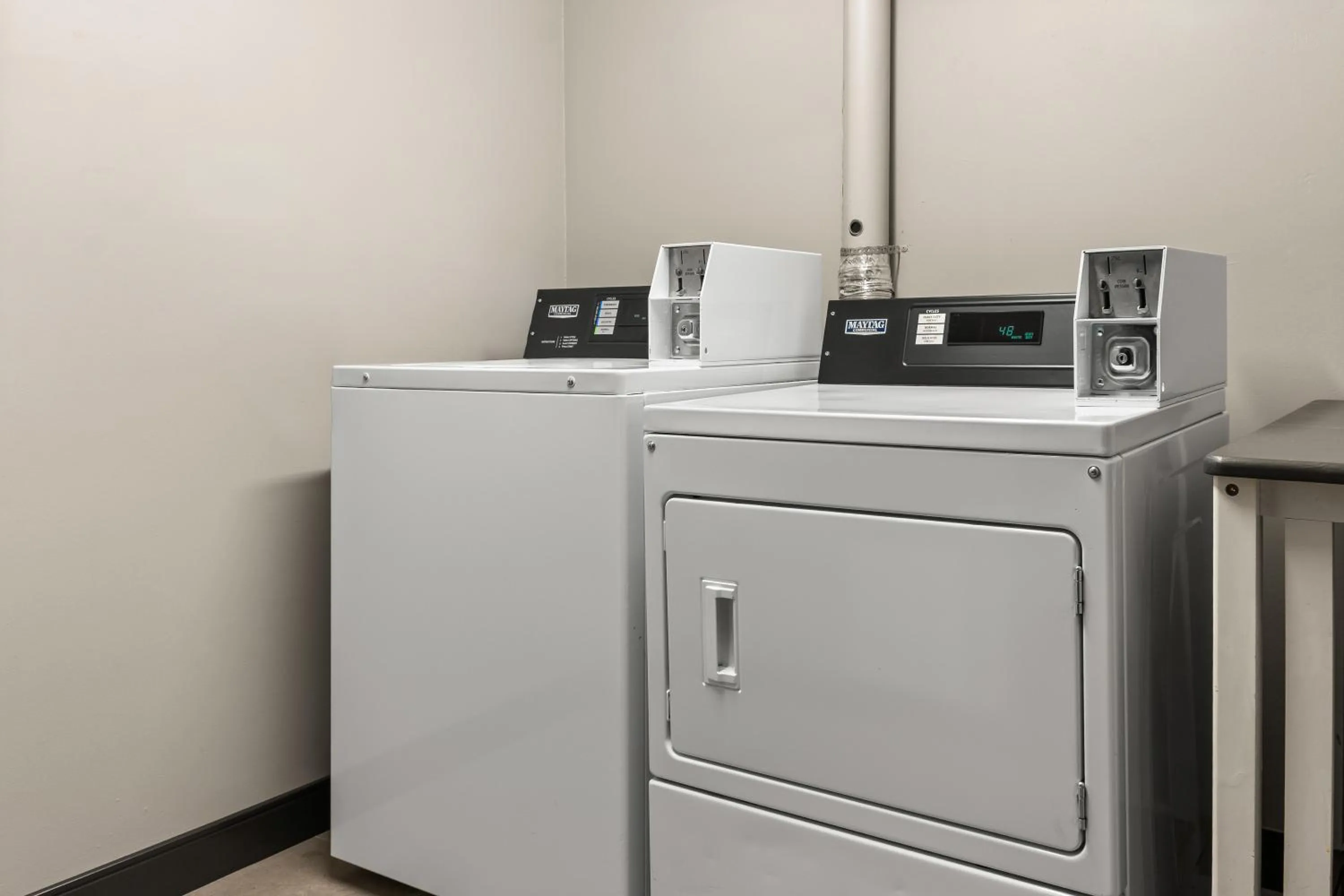 washing machine in Country Inn & Suites by Radisson, Winnipeg, MB