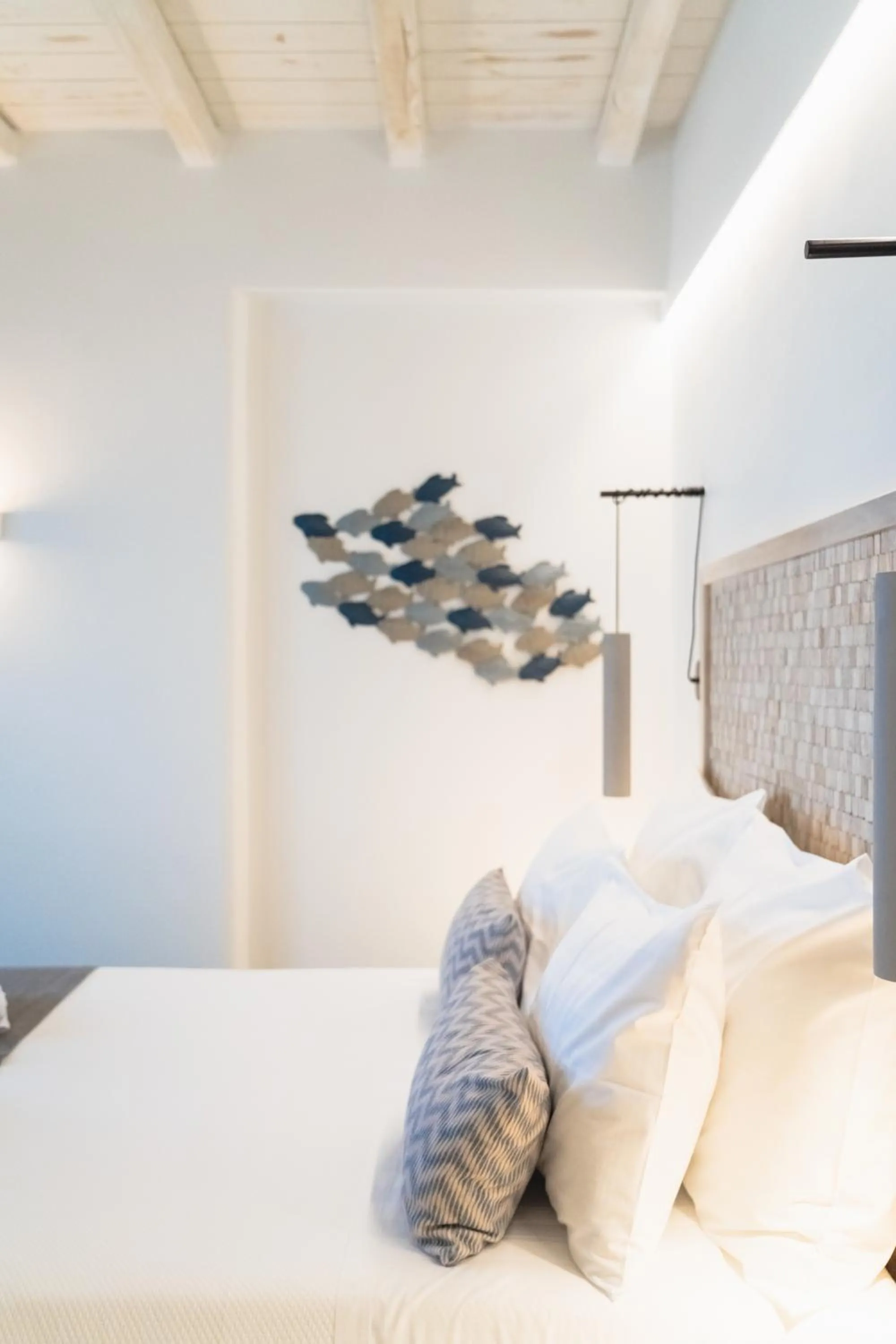 Bed in Lithos Luxury Suites