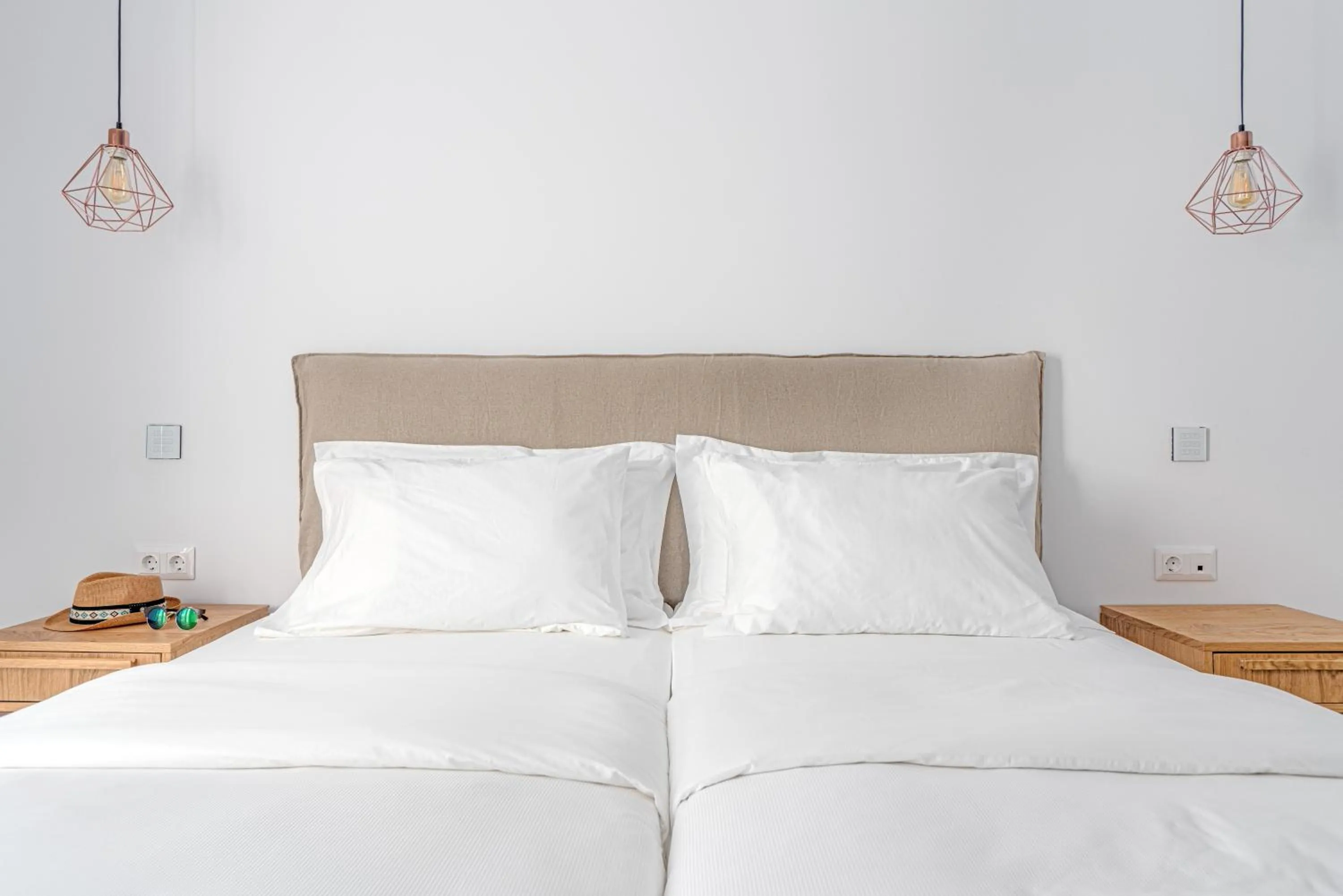 Bed in Omnia Mykonos Boutique Hotel & Suites