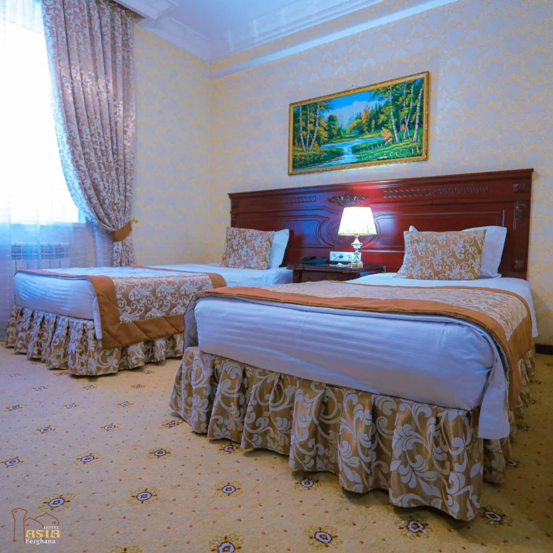 Bed in Asia Hotel Fergana