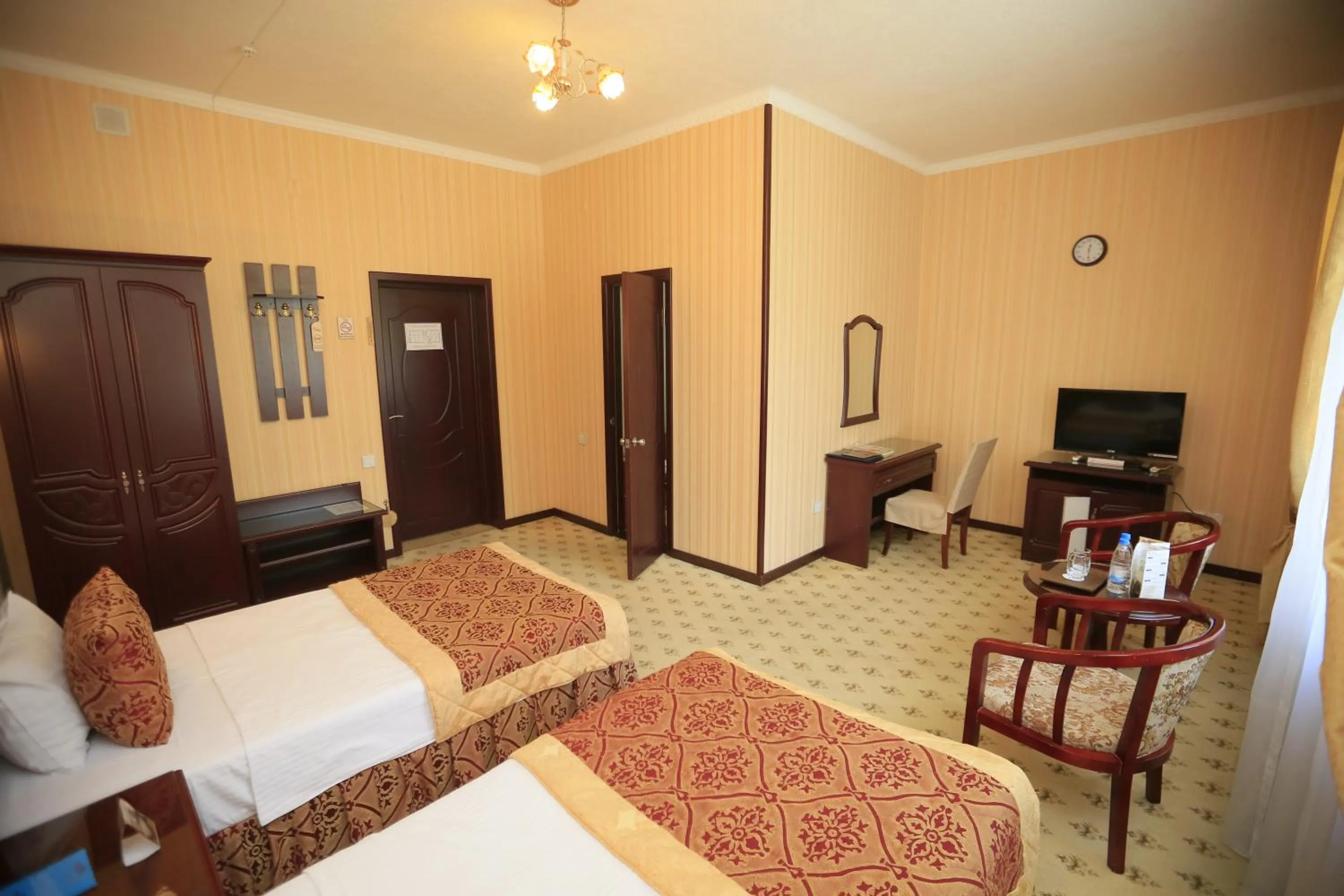 Photo of the whole room, Bed in Asia Hotel Fergana