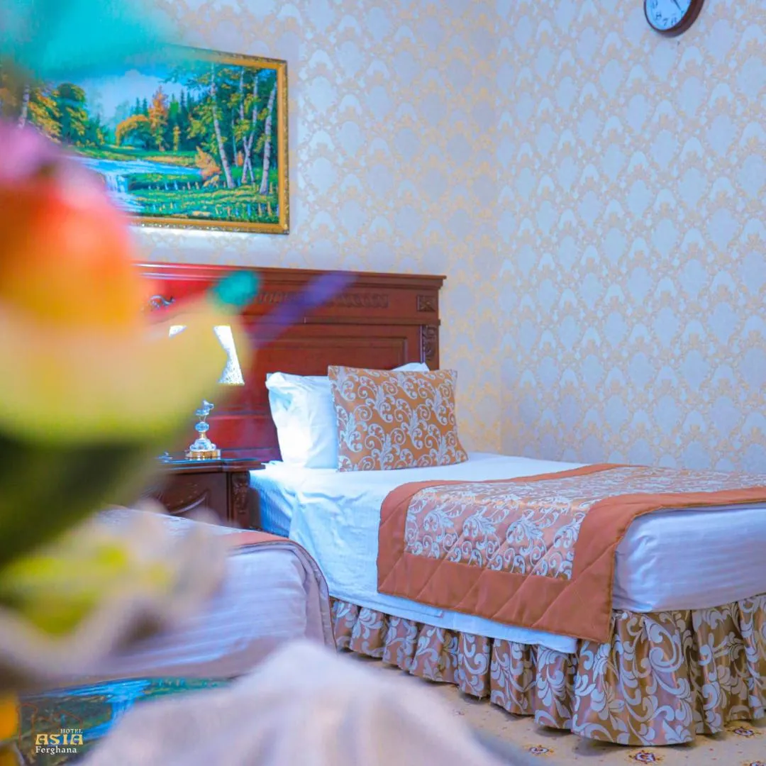 Bed in Asia Hotel Fergana