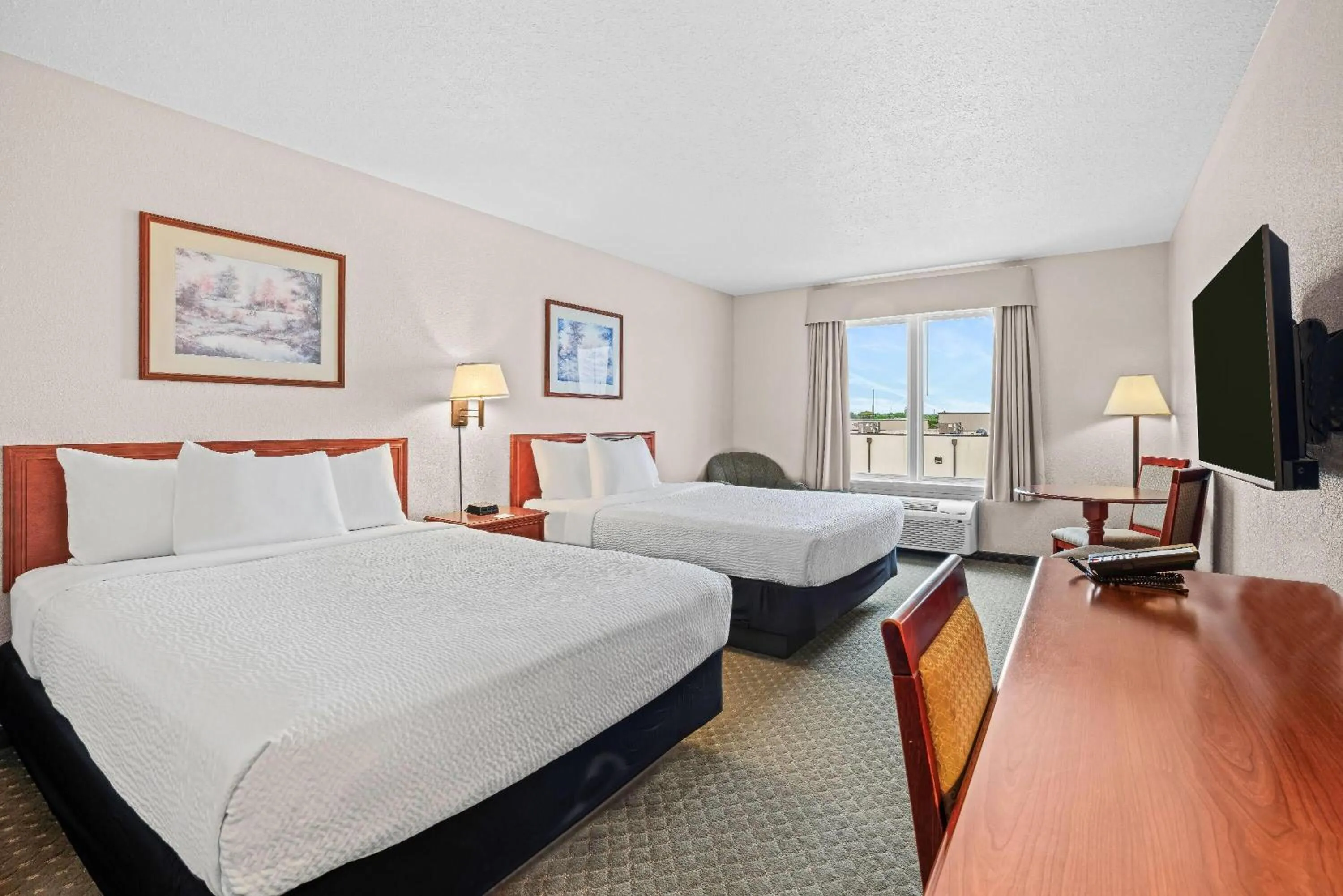 Bed in Days Inn & Suites by Wyndham Winkler