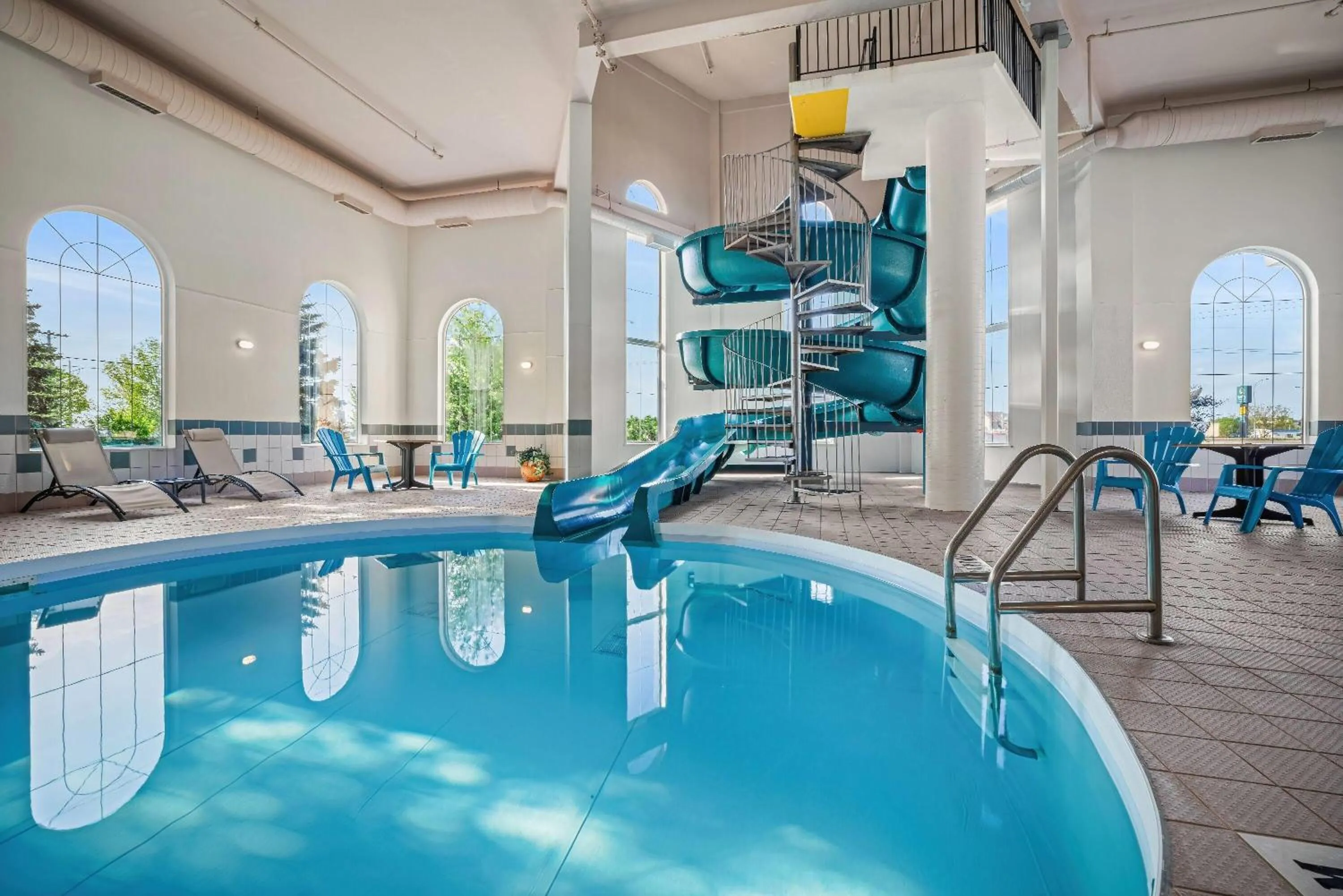 Swimming pool in Days Inn & Suites by Wyndham Winkler