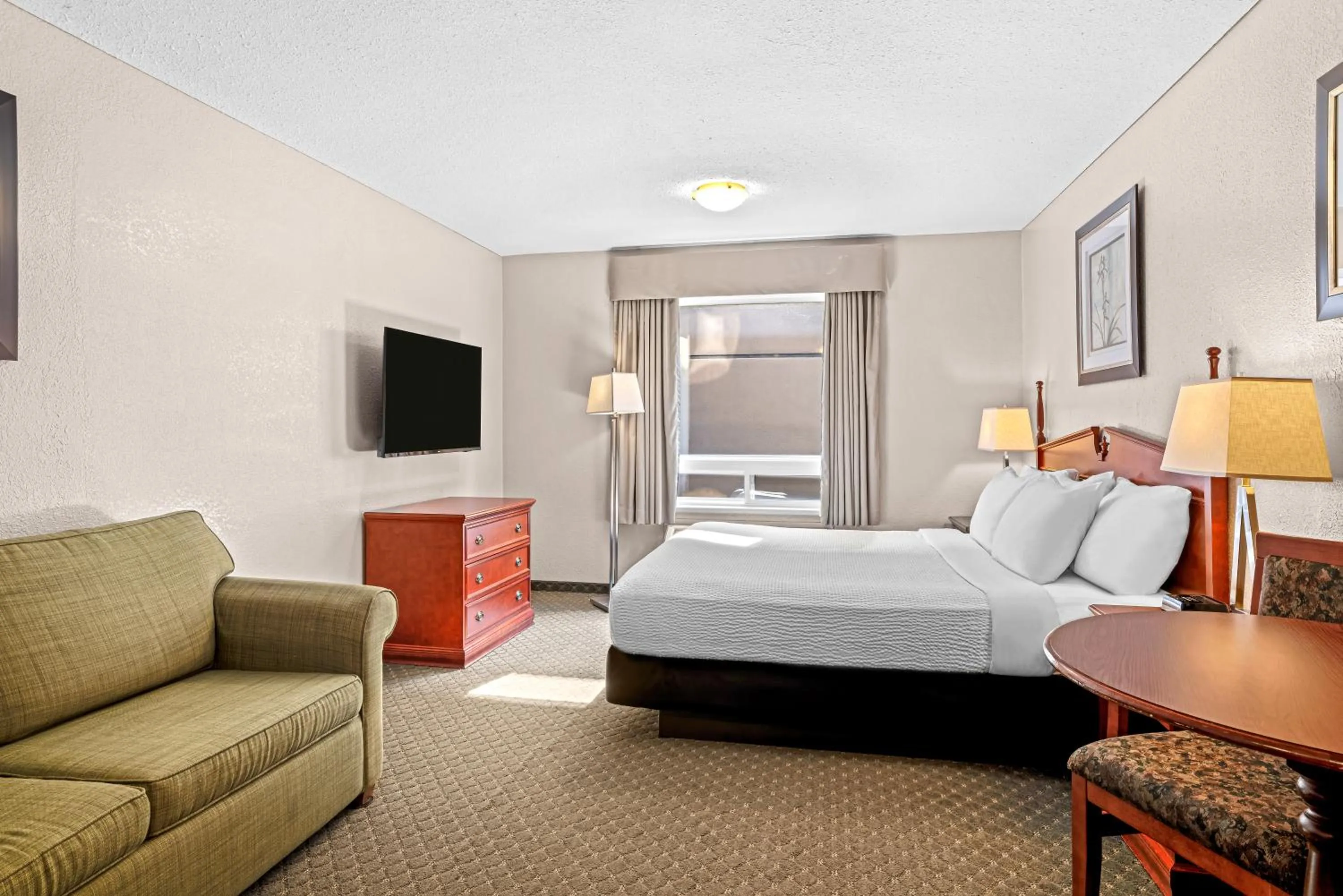 Bed in Days Inn & Suites by Wyndham Winkler