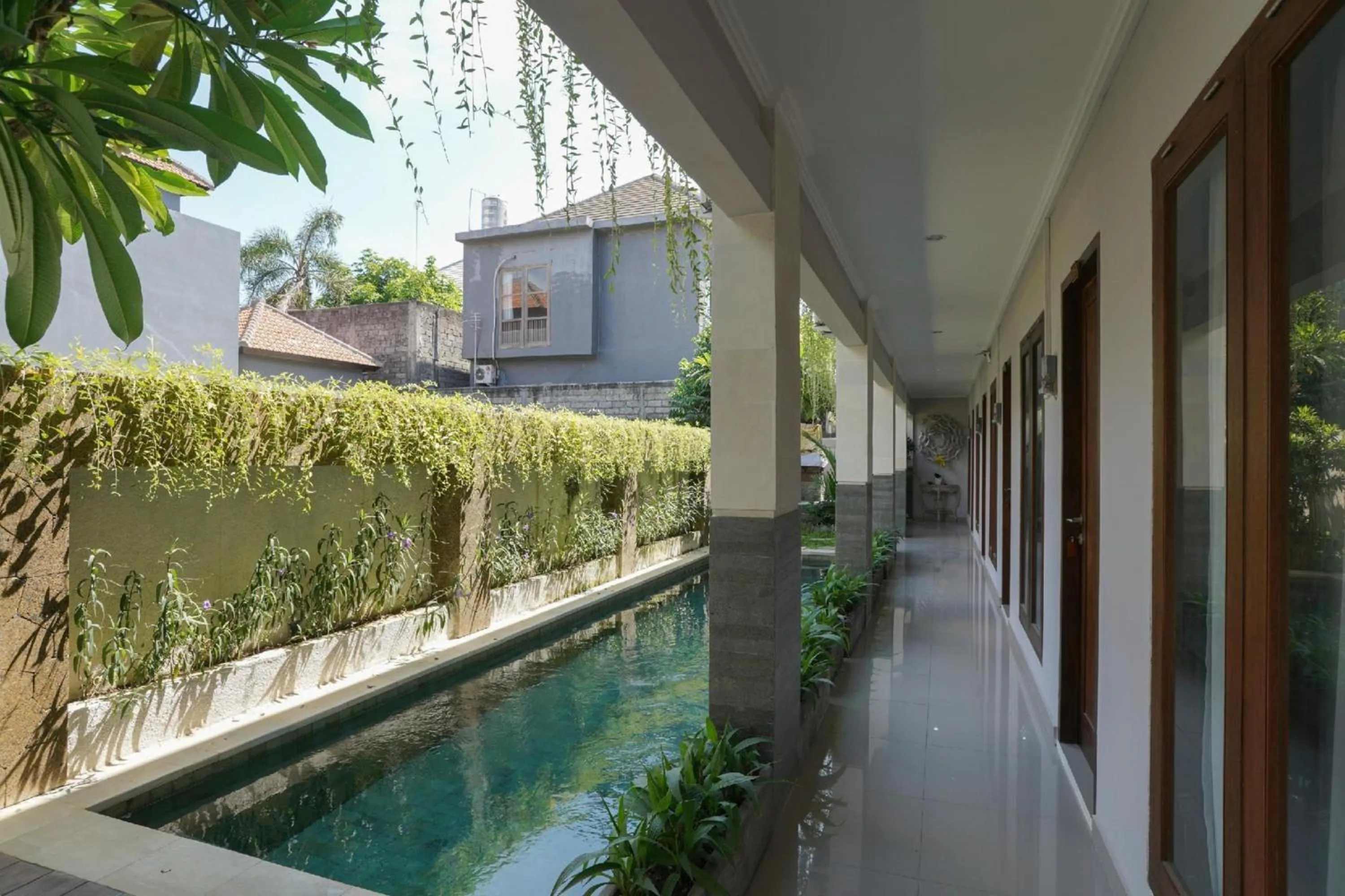 Swimming pool in Capital O 2166 Elitya Stay