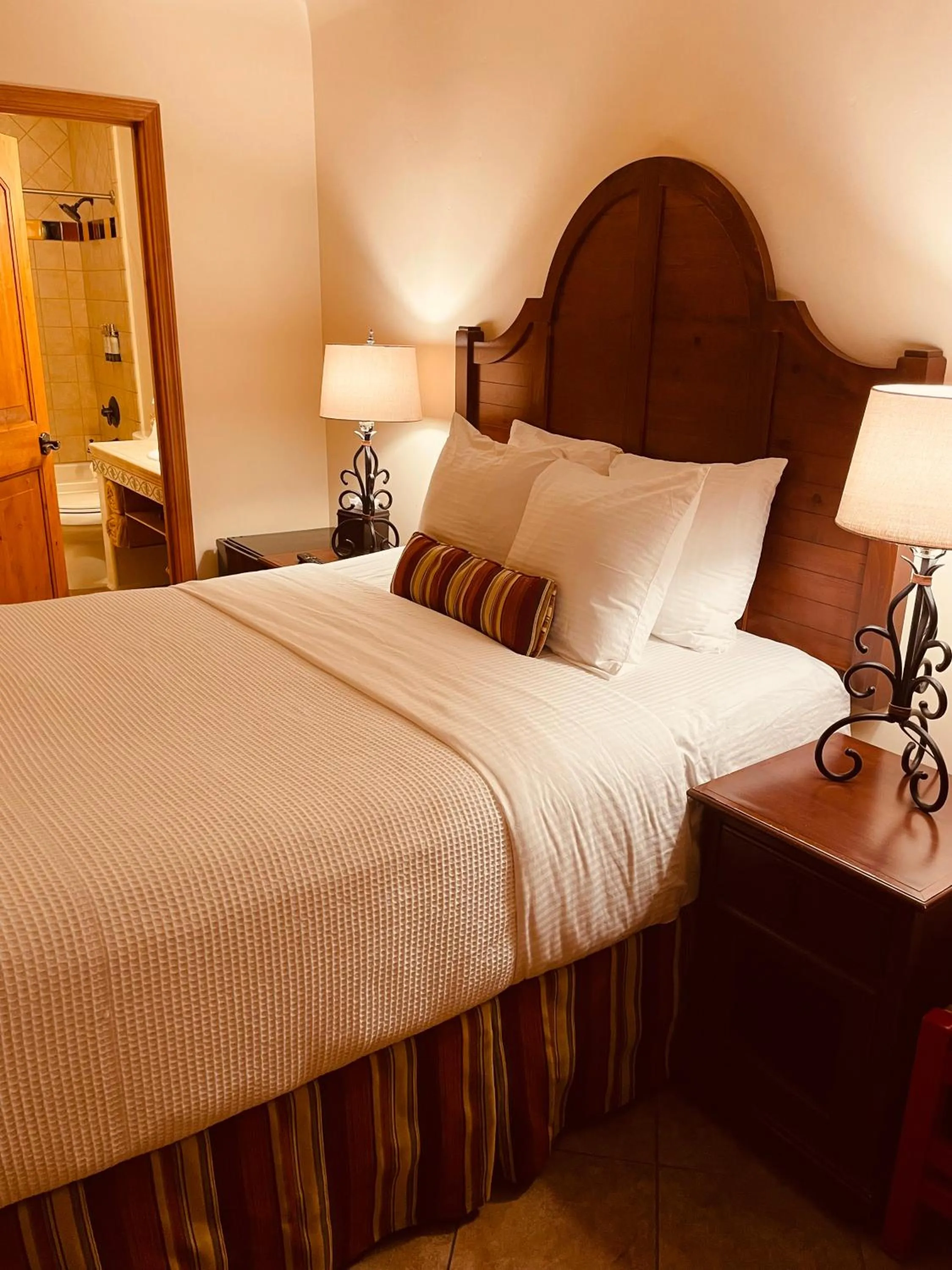 Bed in Los Arboles Hotel