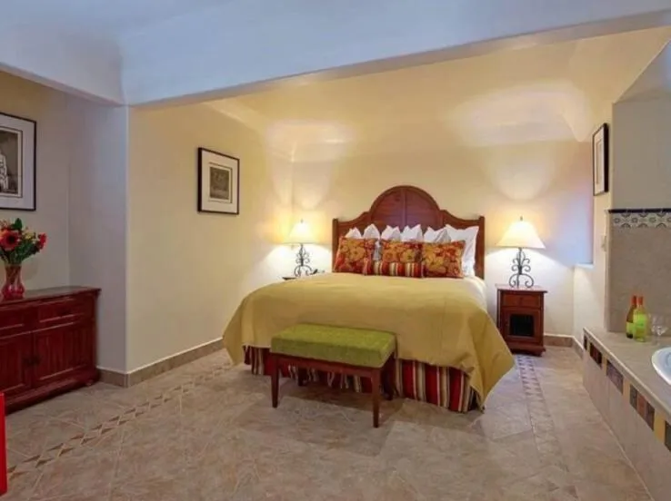 Bed in Los Arboles Hotel