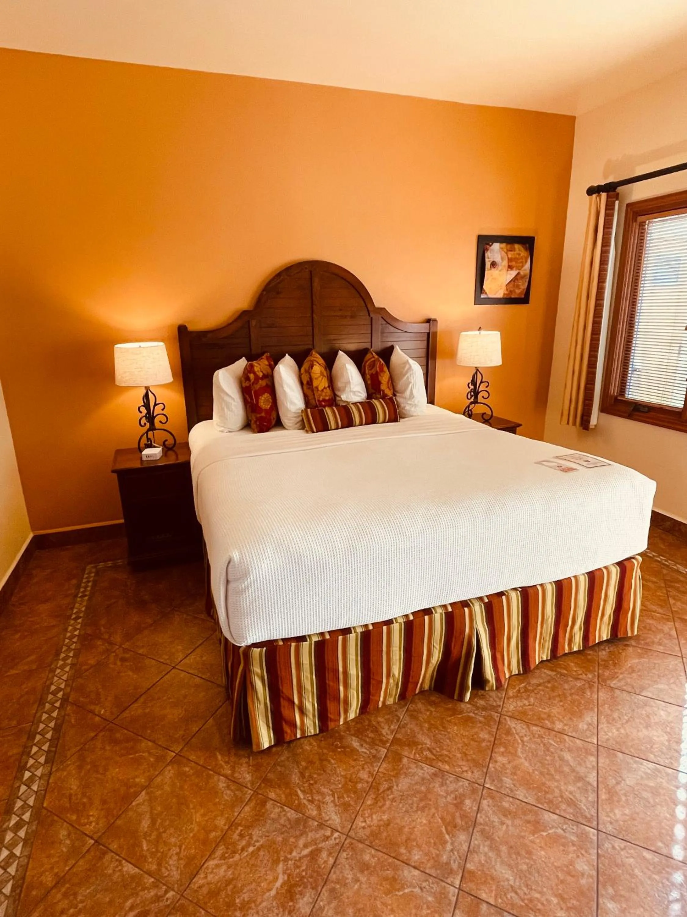 Bed in Los Arboles Hotel