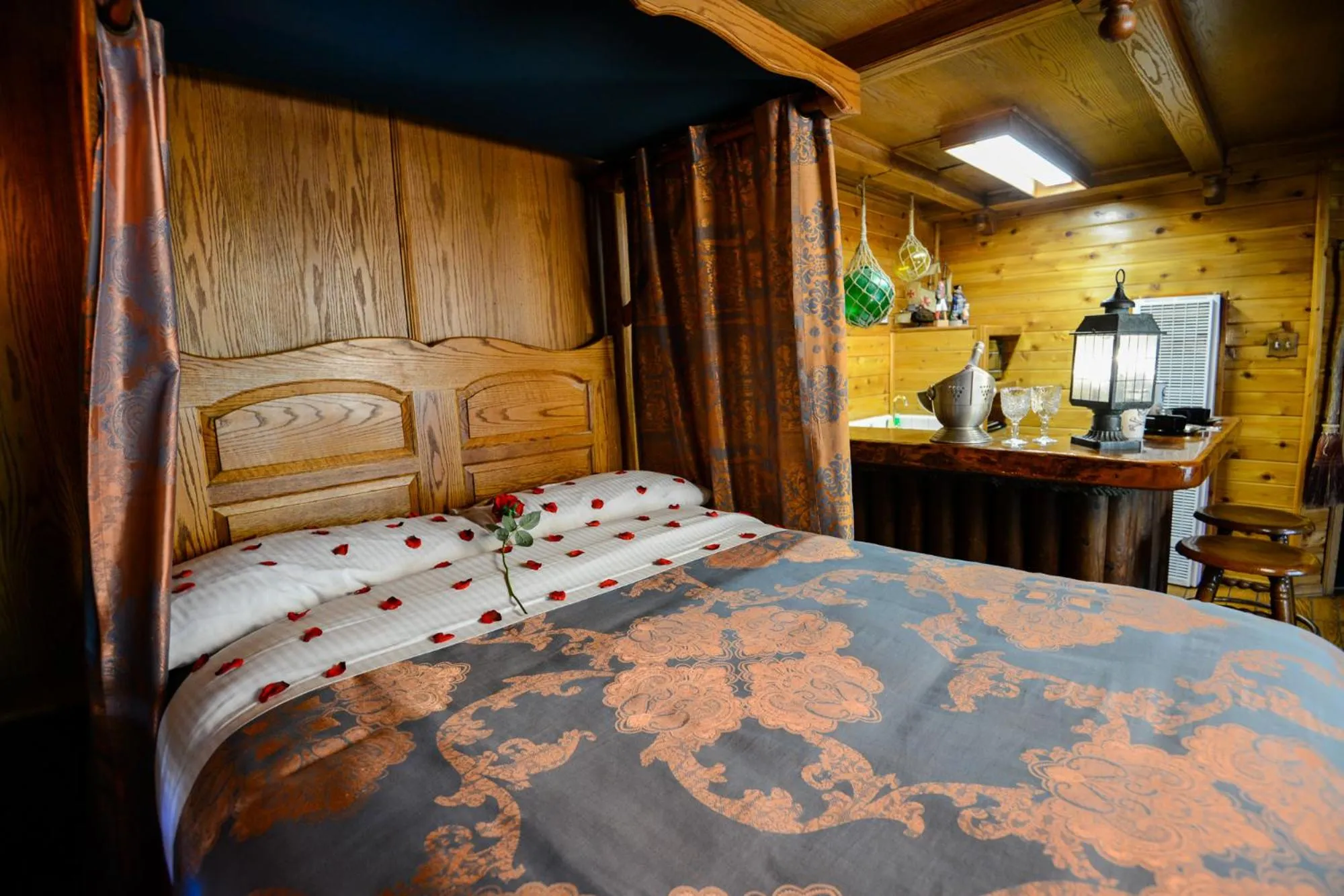Bed in Castle Wood Theme Cottages- COUPLES ONLY
