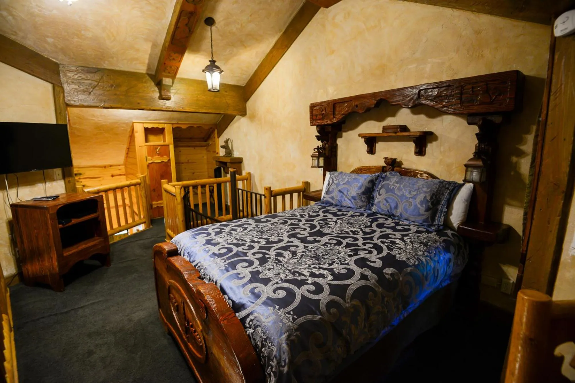 Bed in Castle Wood Theme Cottages- COUPLES ONLY