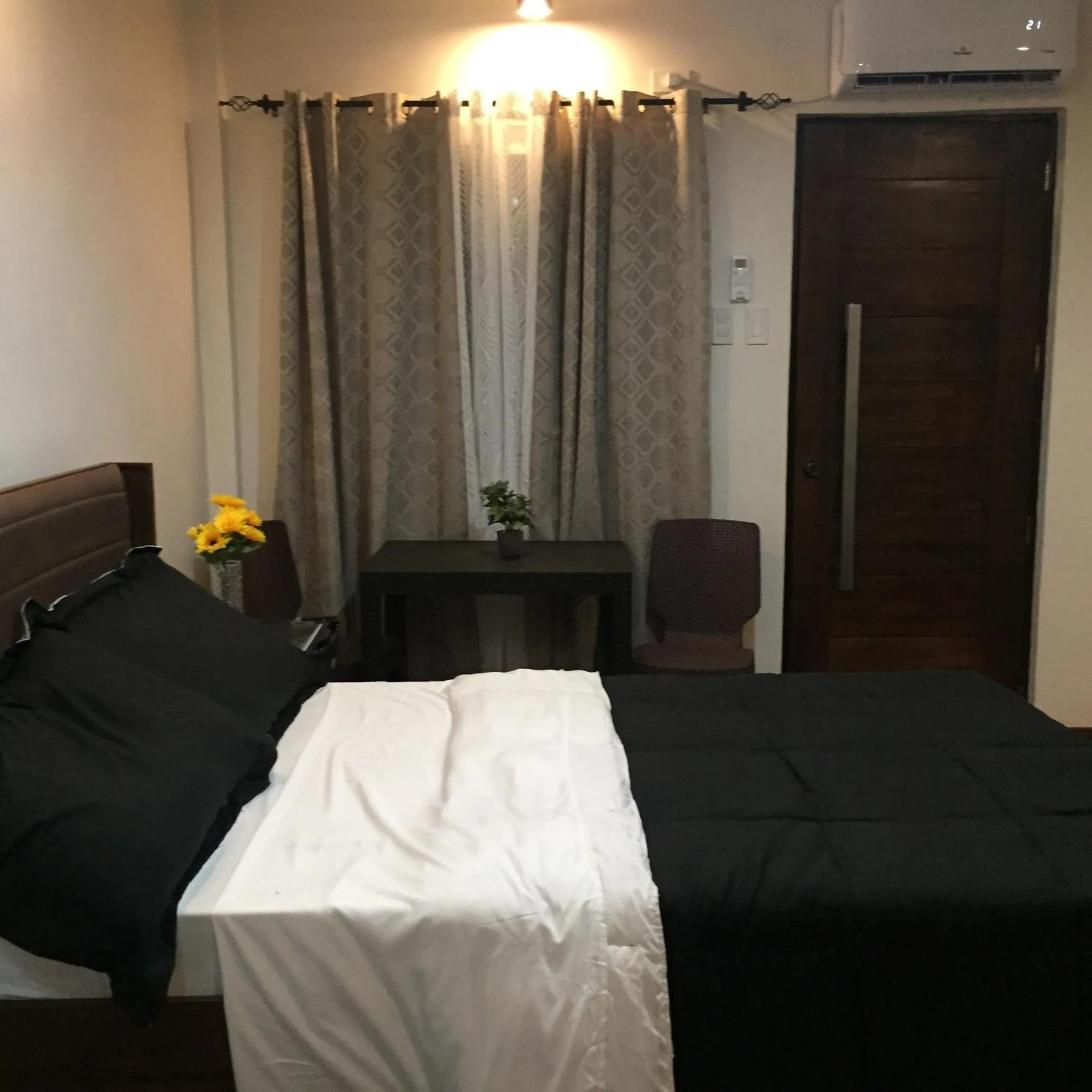 Bed in MIRASOL Residences