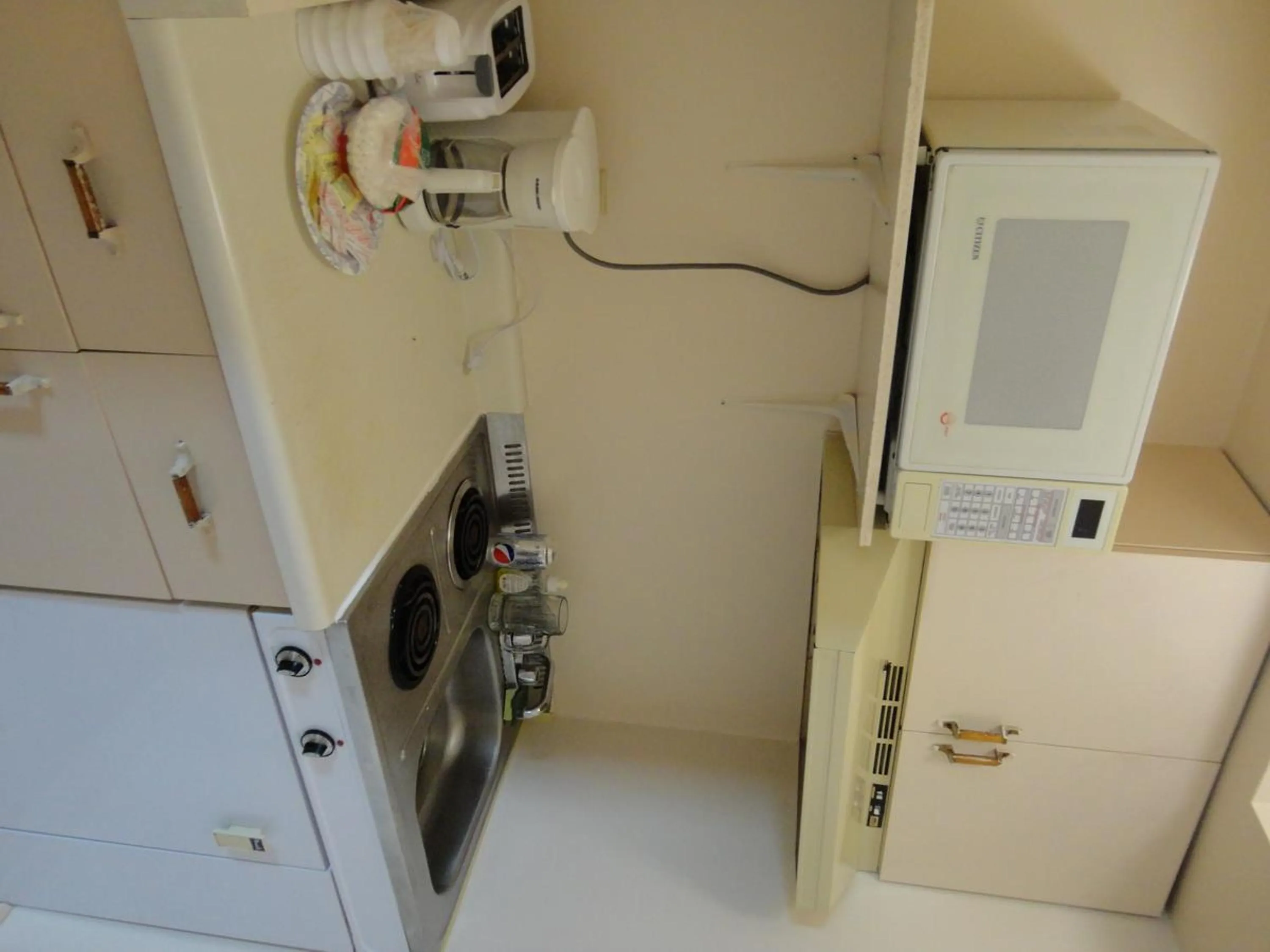 Kitchen or kitchenette in Good Night Inn