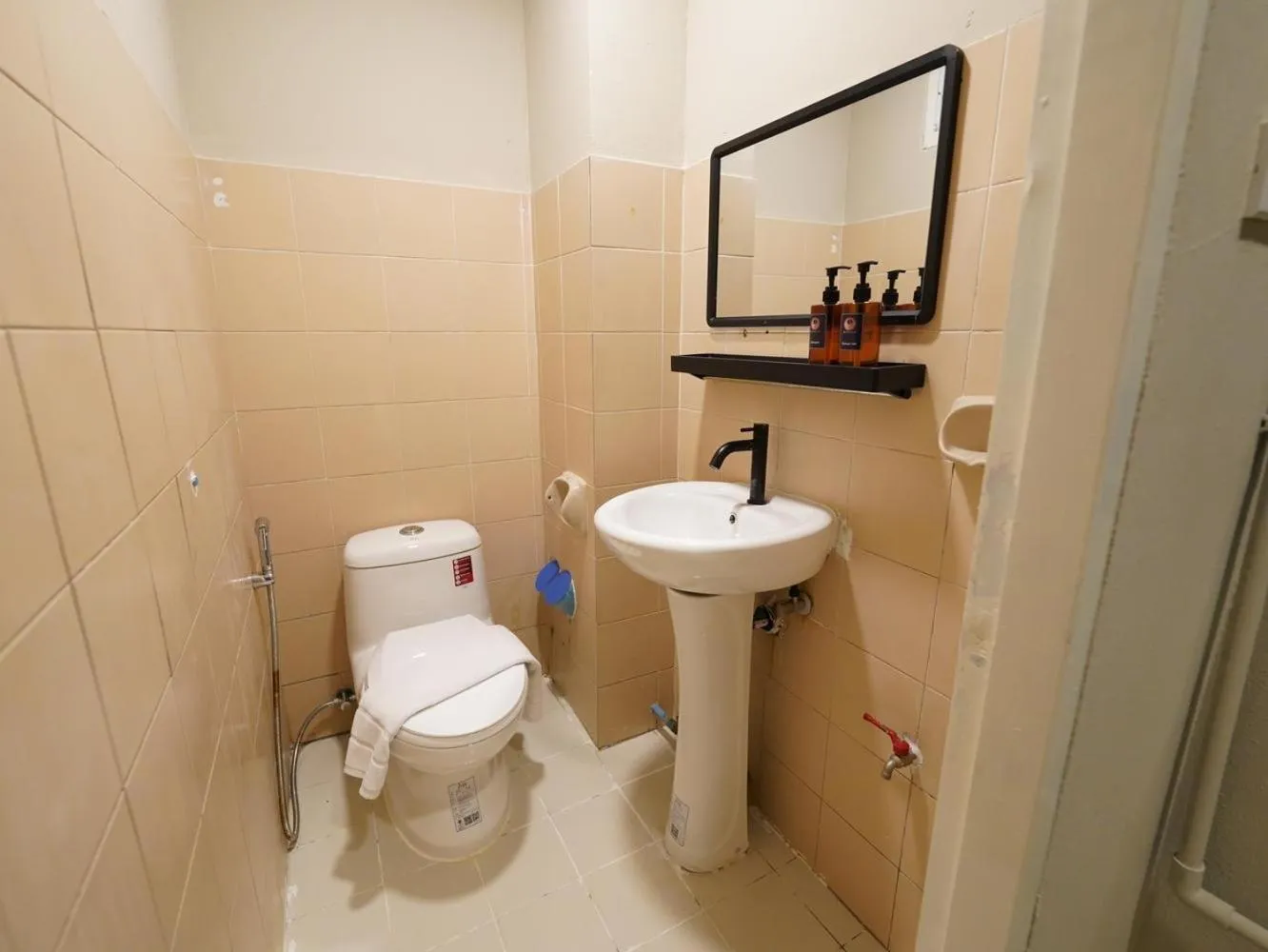 Bathroom in RQ Bangkok Sukhumvit 107 by Collection O