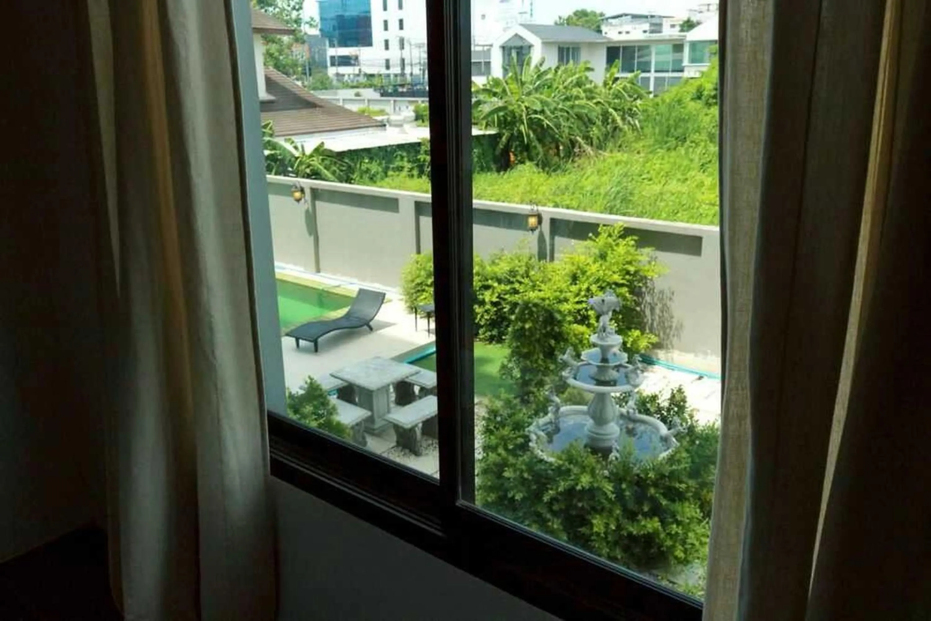 Garden view in RQ Bangkok Sukhumvit 107 by Collection O