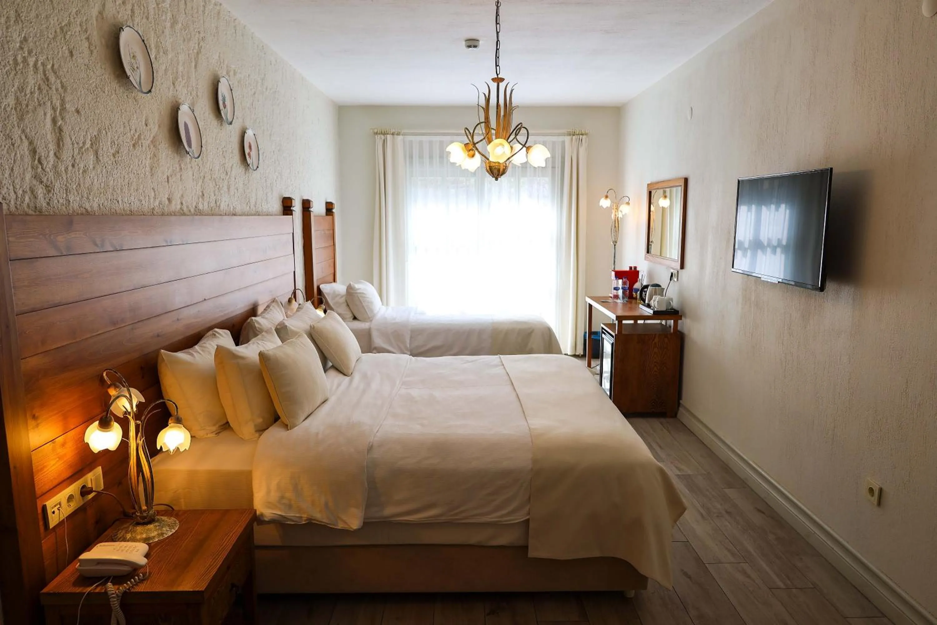 Coffee/tea facilities, Bed in AlaBora Hotel