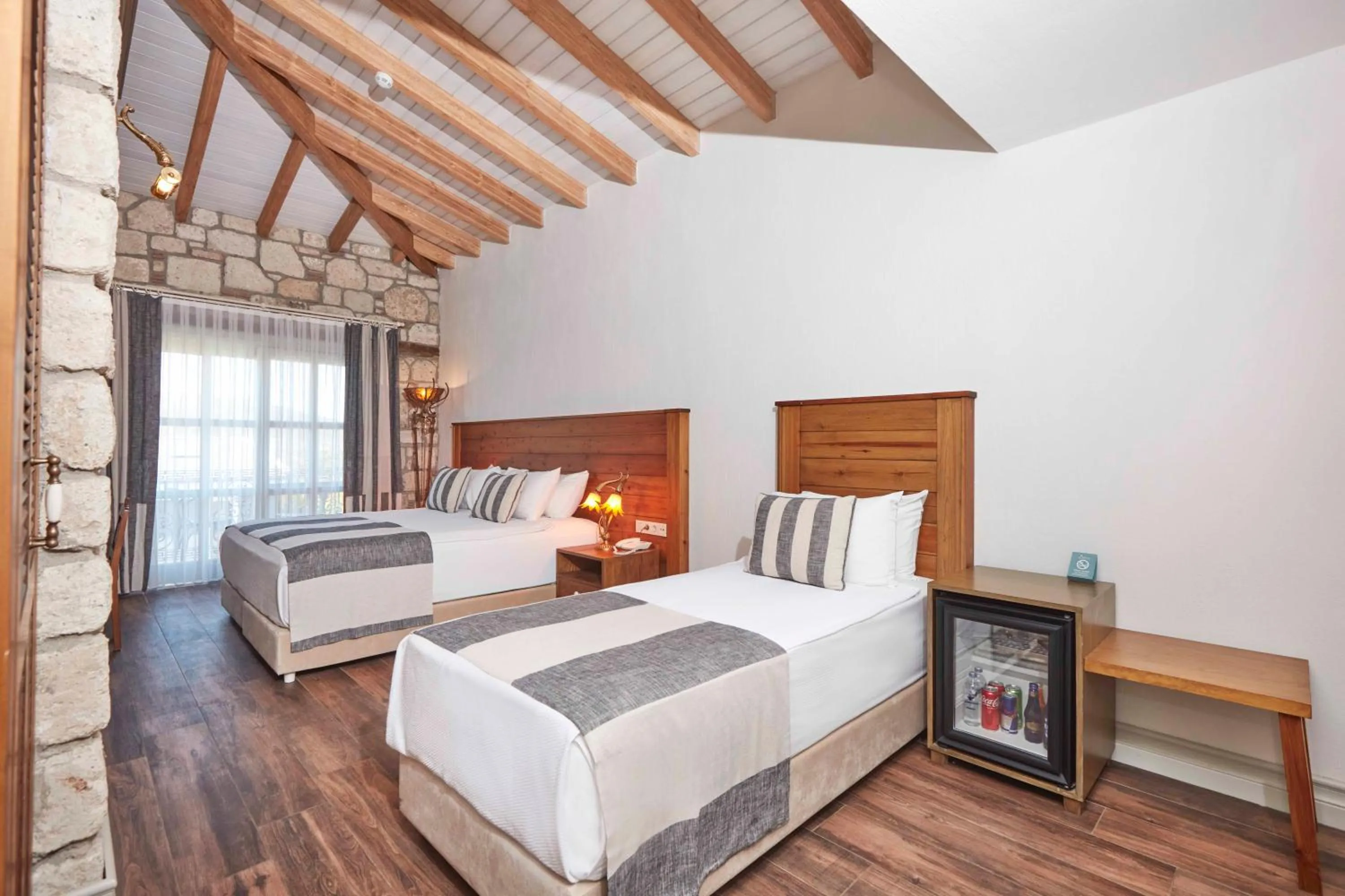 Bed in AlaBora Hotel