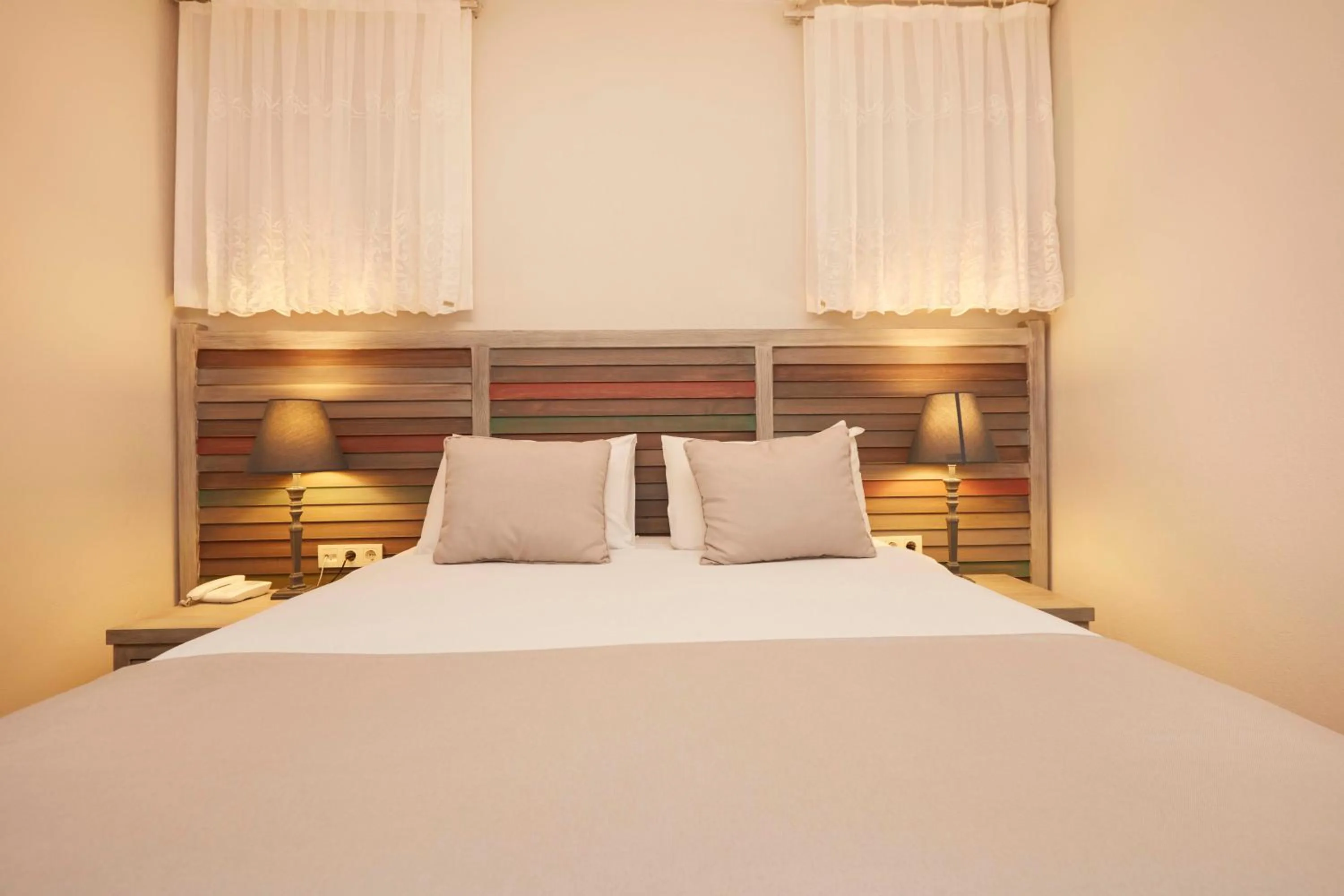 Bed in AlaBora Hotel