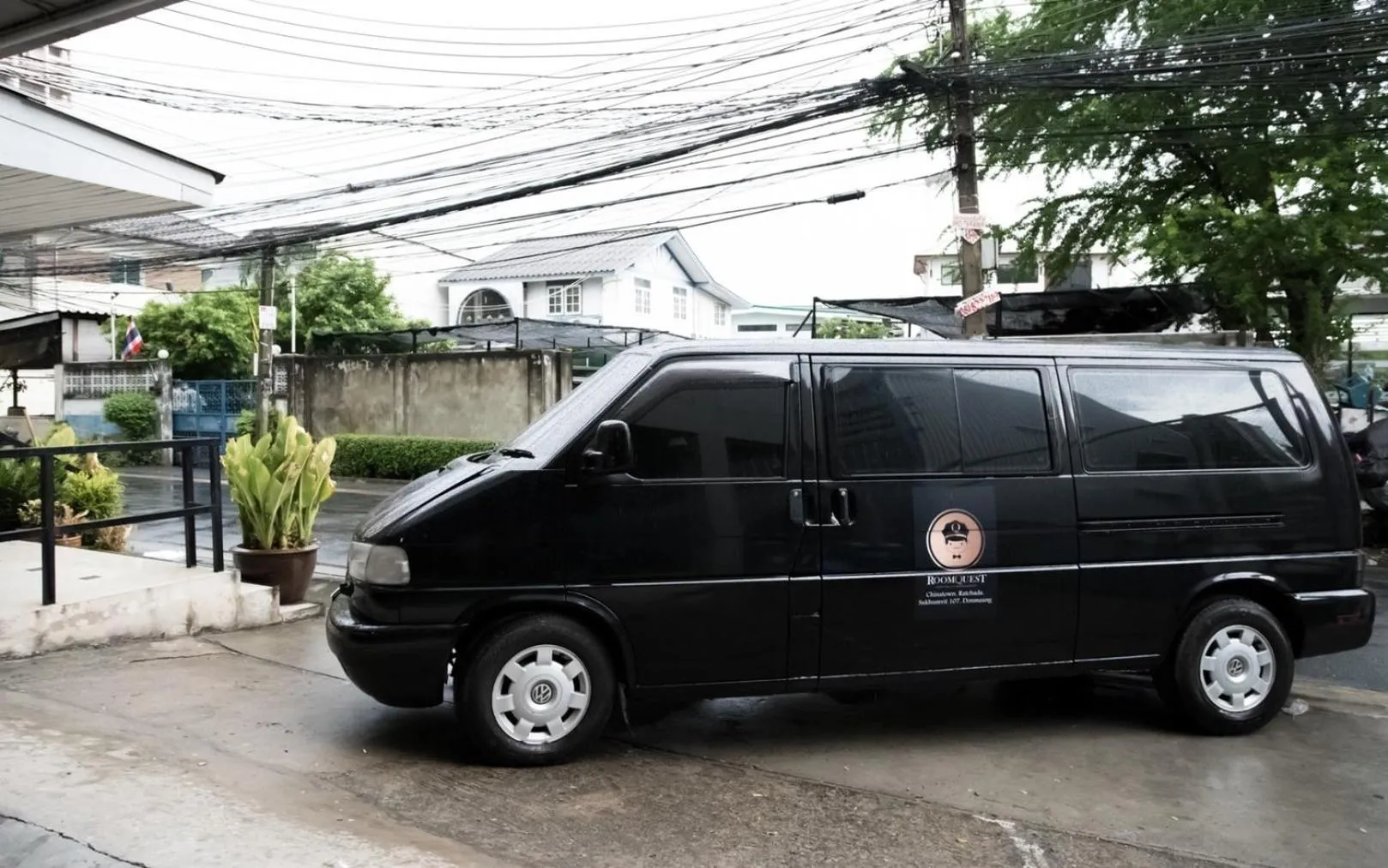 Property logo or sign in RoomQuest Bangkok Ratchada