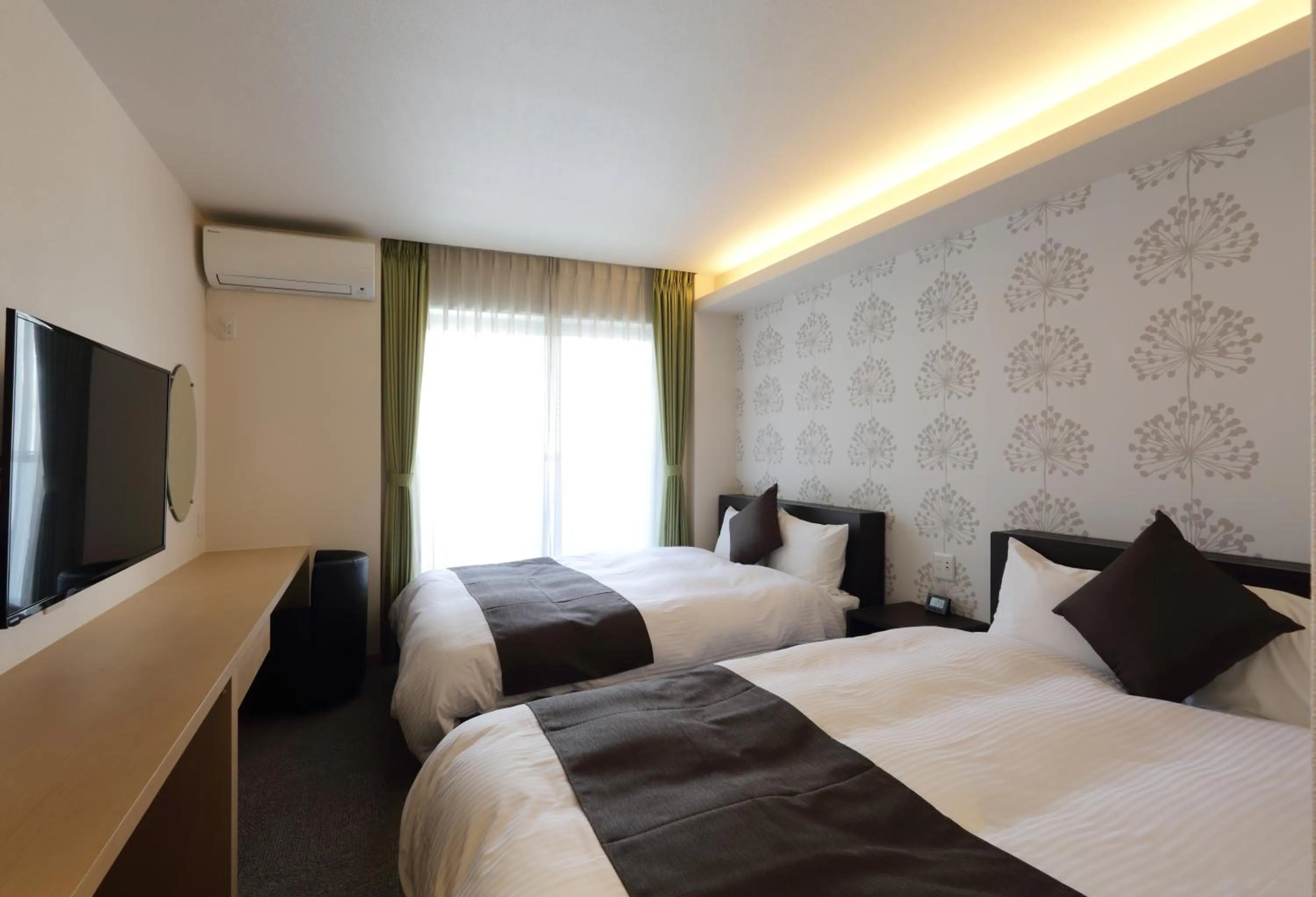 Bed in HOTEL PROMOTE HIROSHIMA