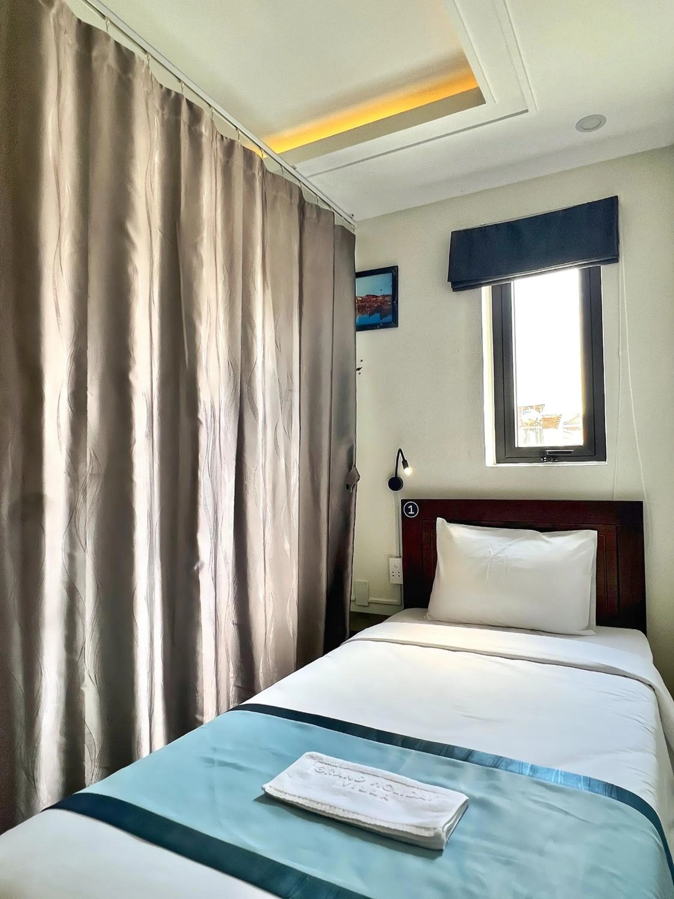 Bed in Grand Holiday Hoian Villa