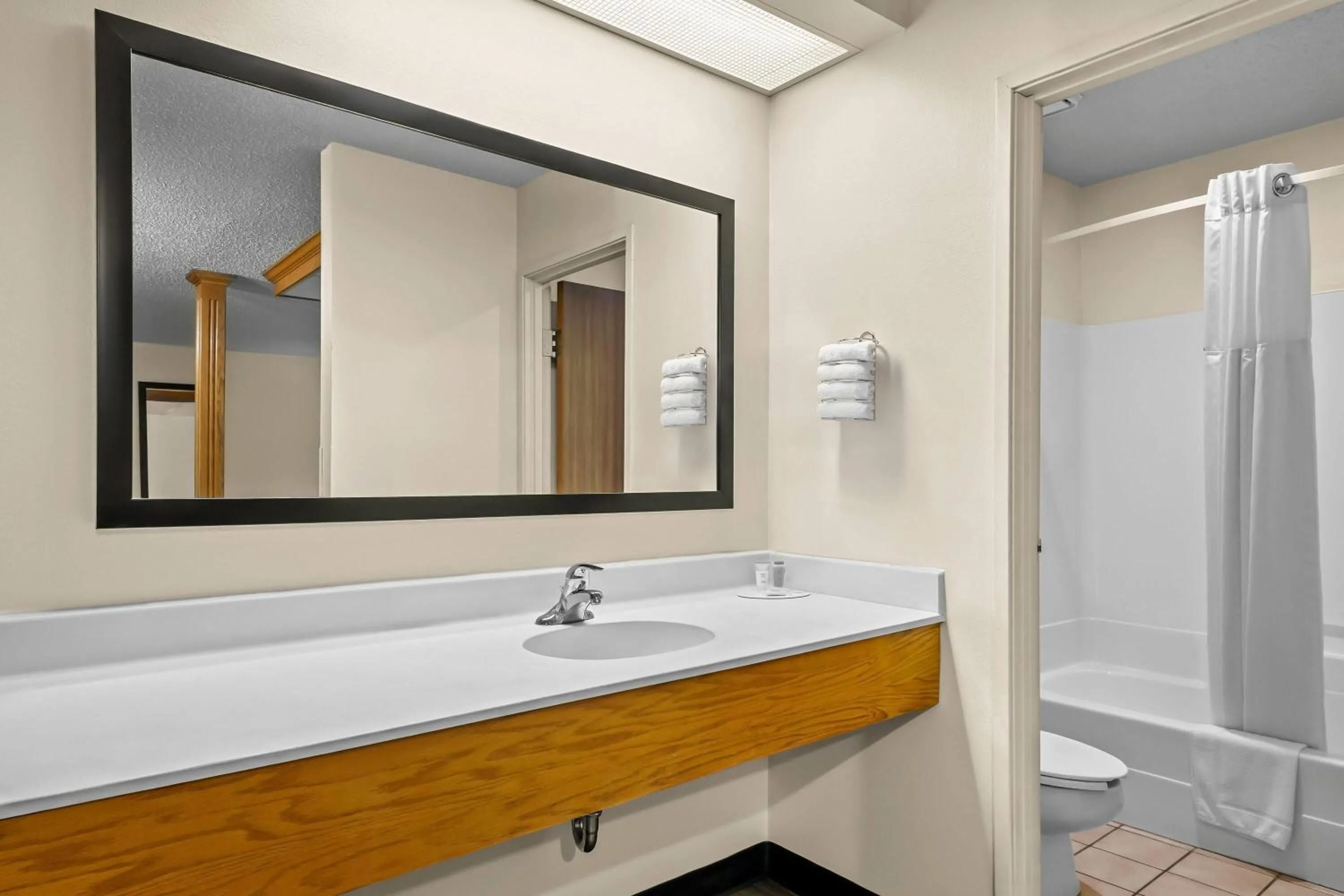 Bathroom in Super 8 by Wyndham Watertown WI