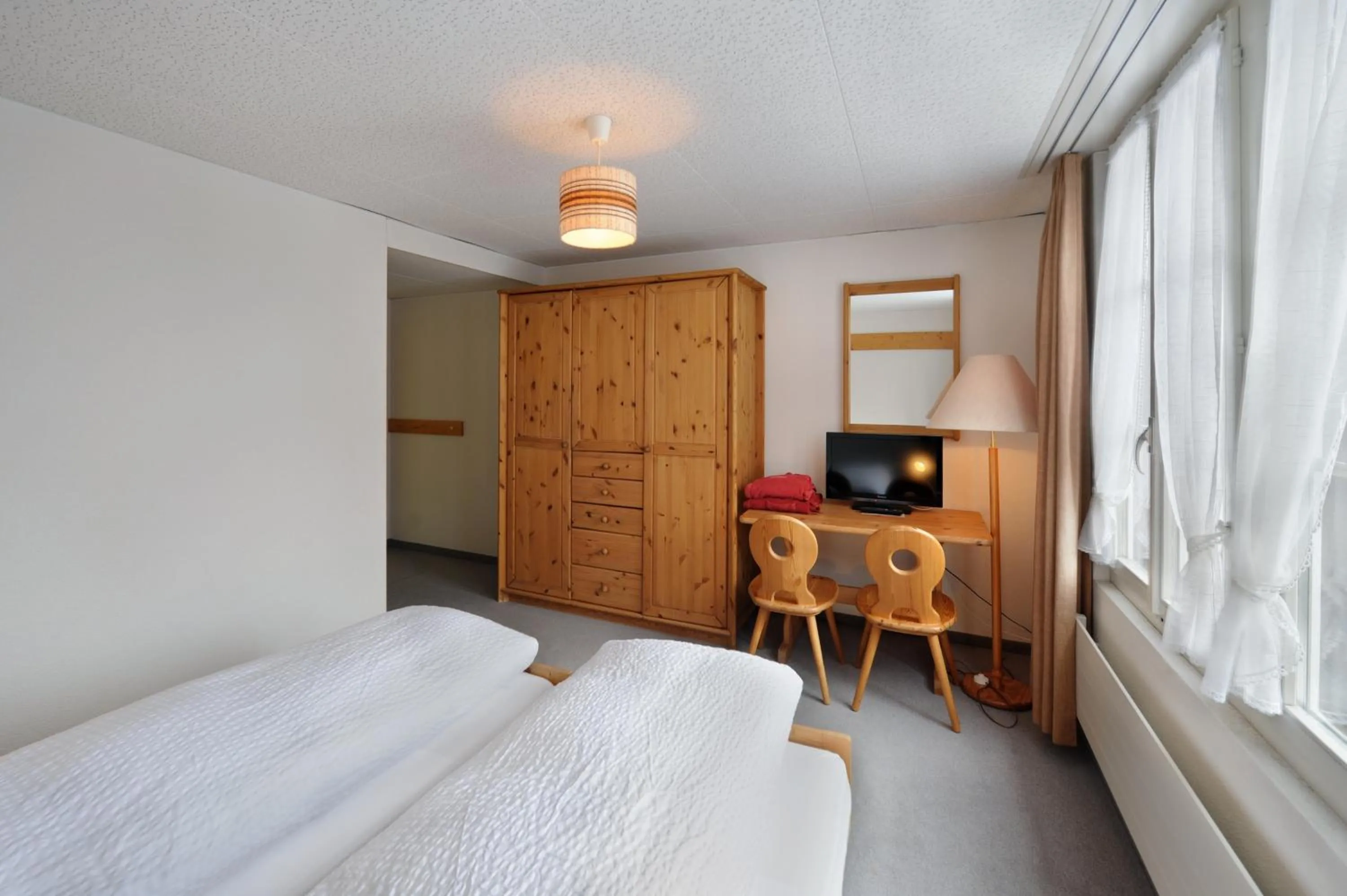 Photo of the whole room, Bed in Hotel Krone Budget