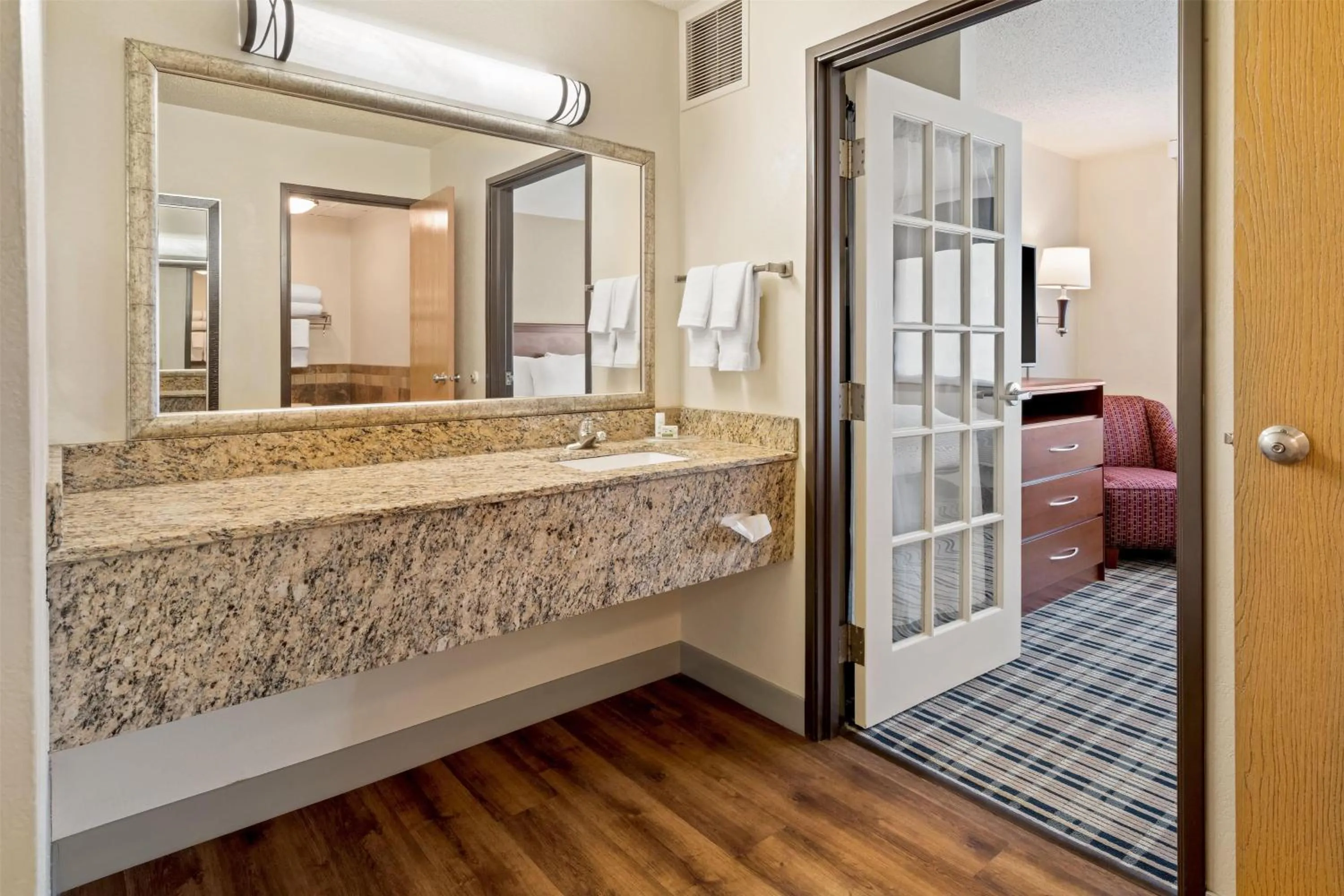 Photo of the whole room in AmericInn by Wyndham Dickinson