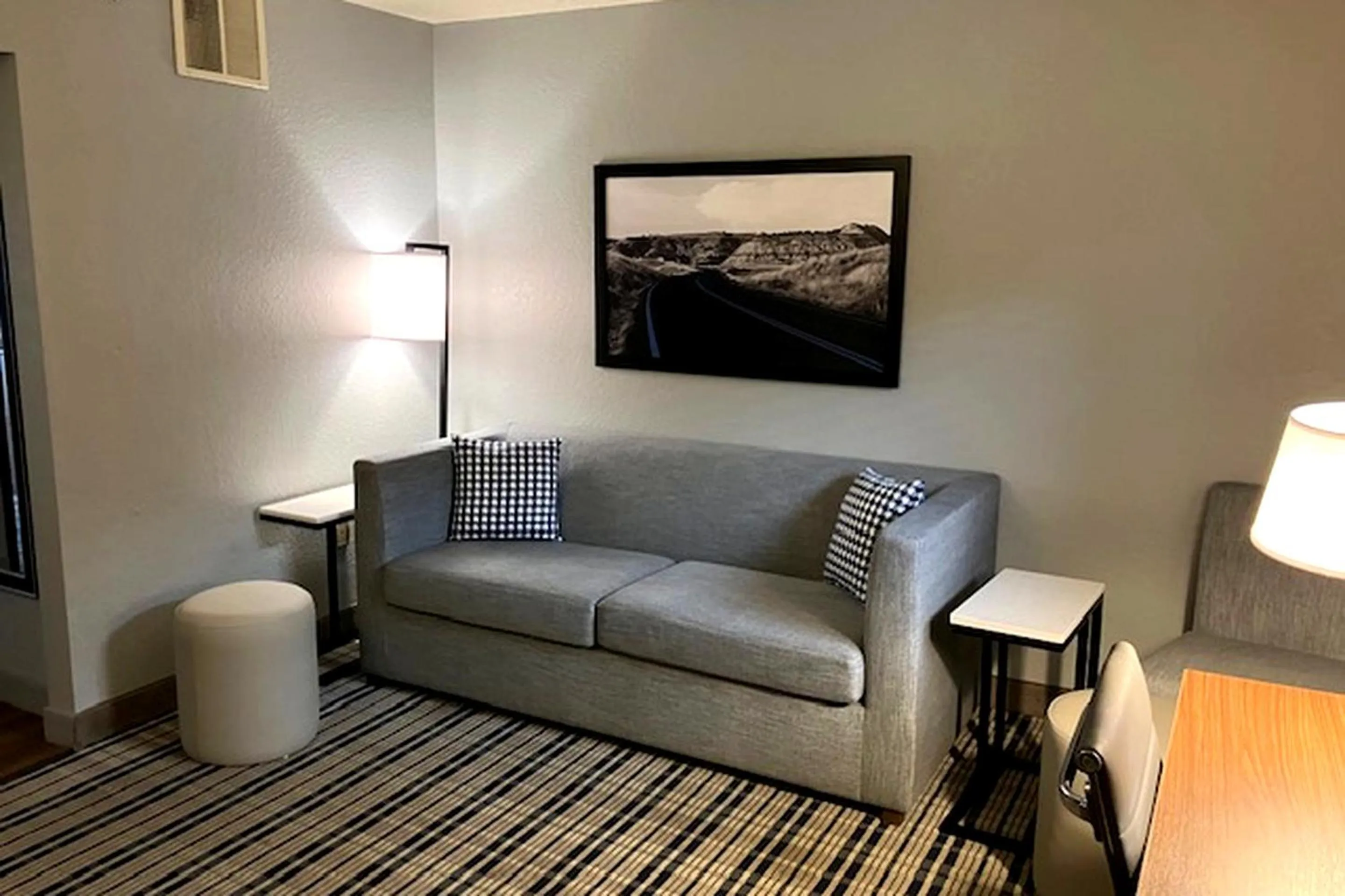 Living room in AmericInn by Wyndham Dickinson