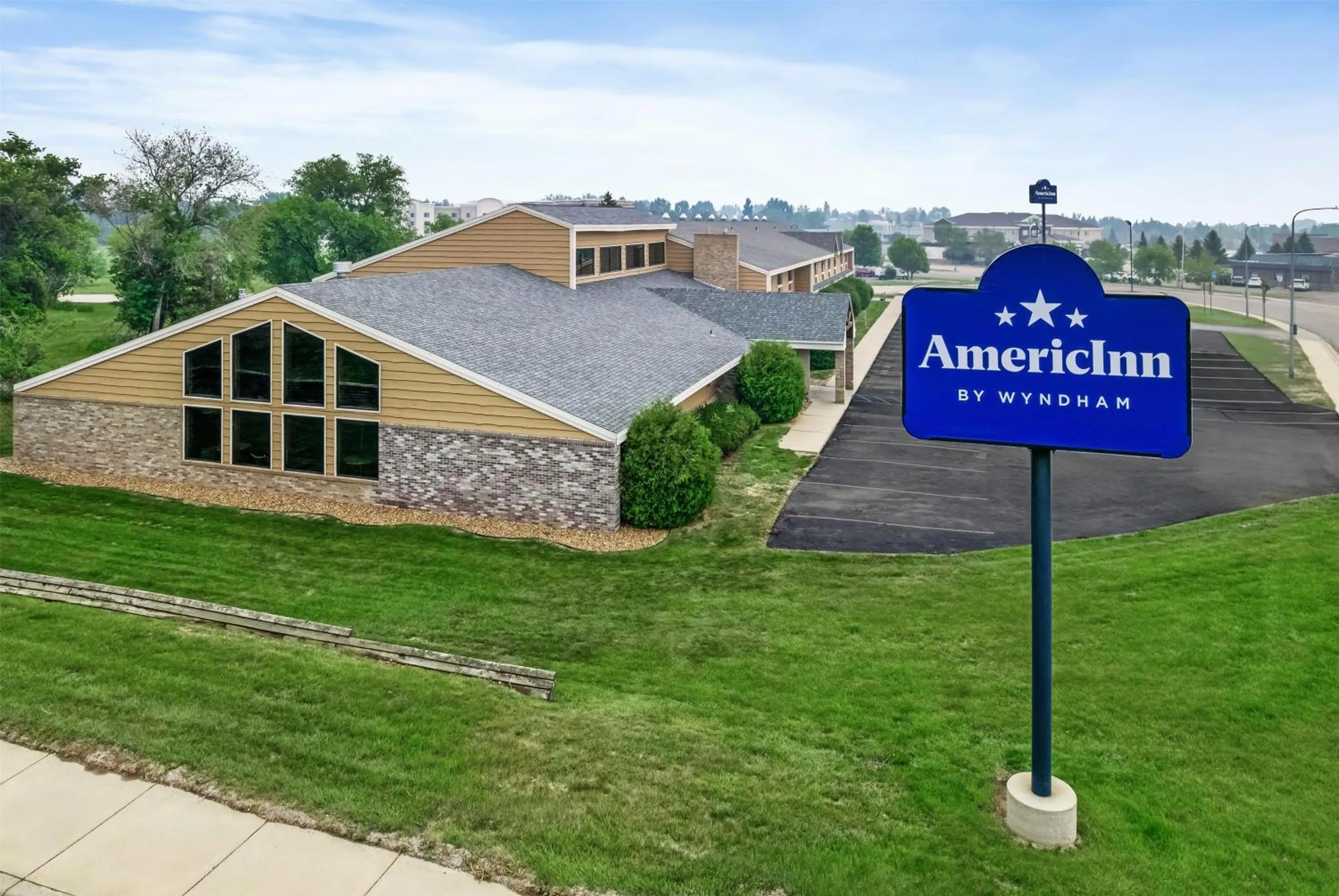 Property building in AmericInn by Wyndham Dickinson