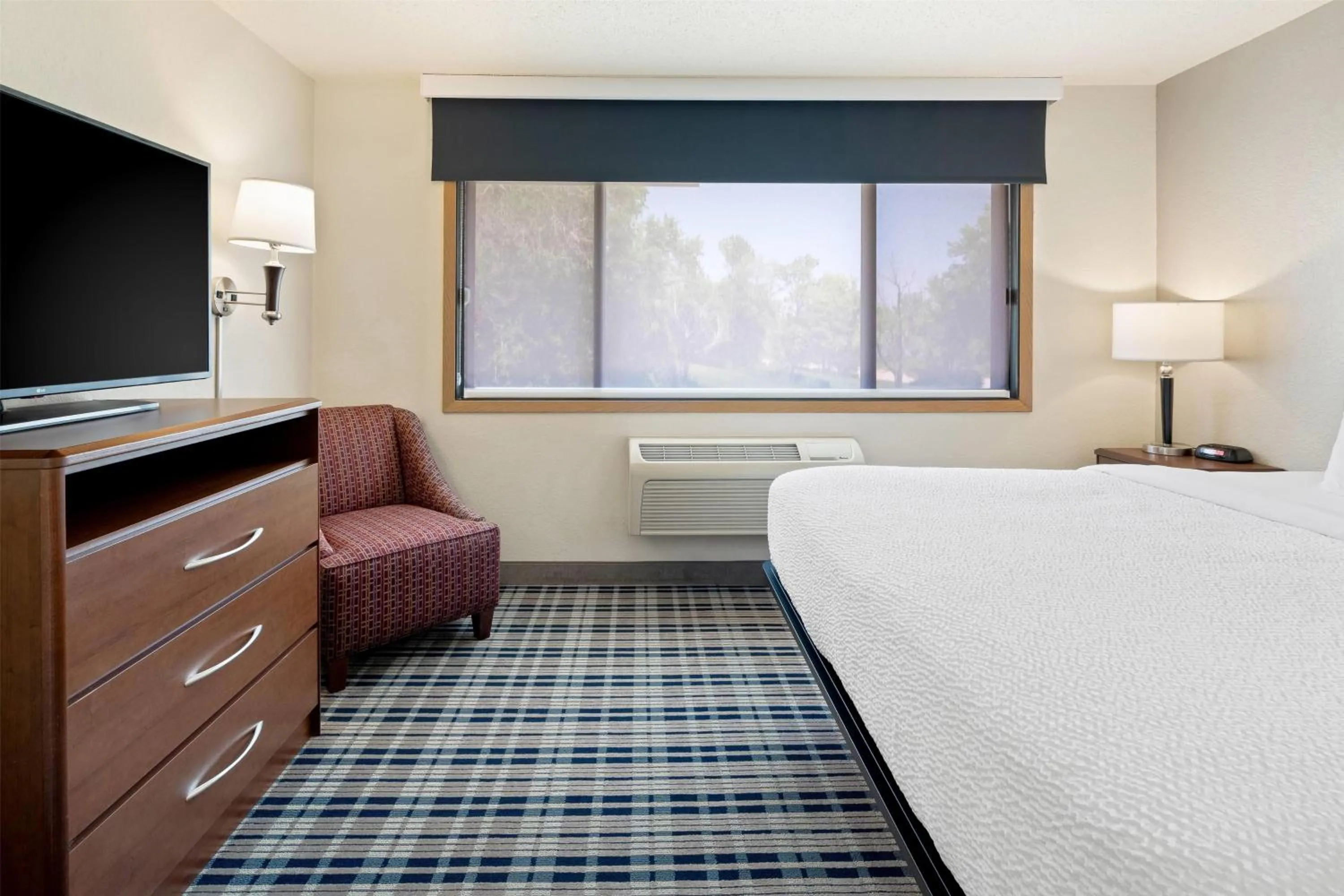 Photo of the whole room, Bed in AmericInn by Wyndham Dickinson