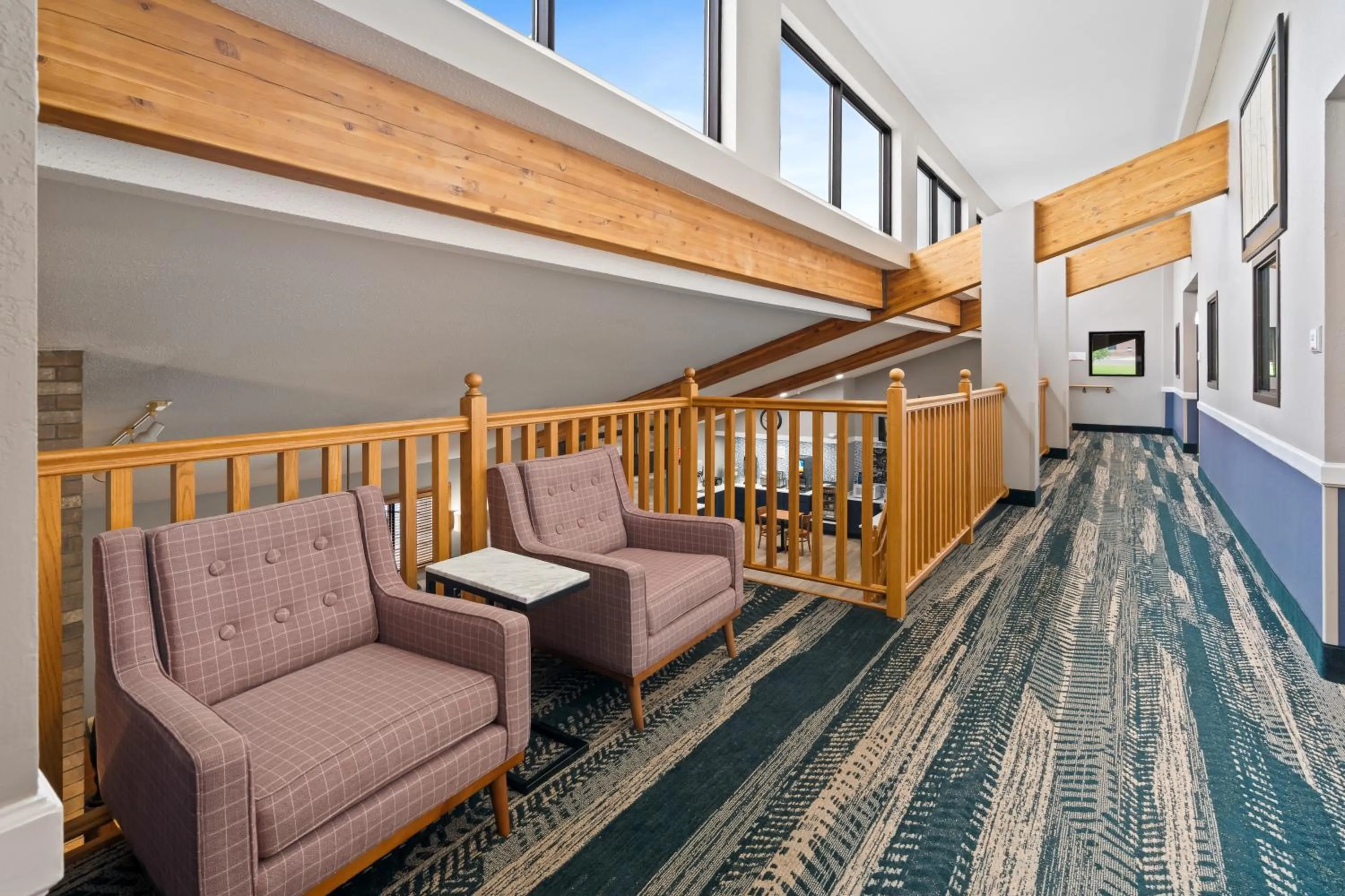 Seating area in AmericInn by Wyndham Dickinson