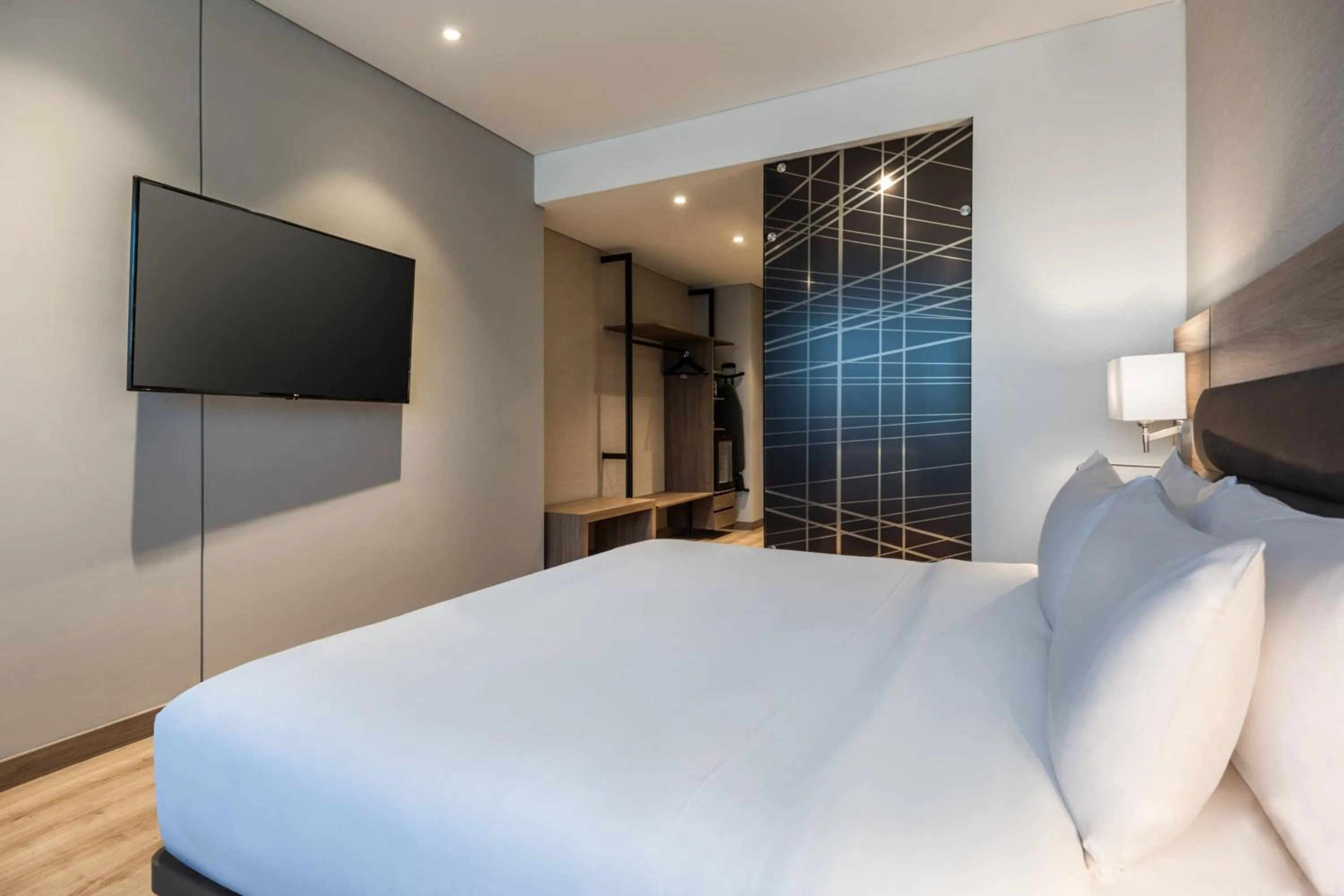 Photo of the whole room, Bed in AC Hotel by Marriott Bogota Zona T